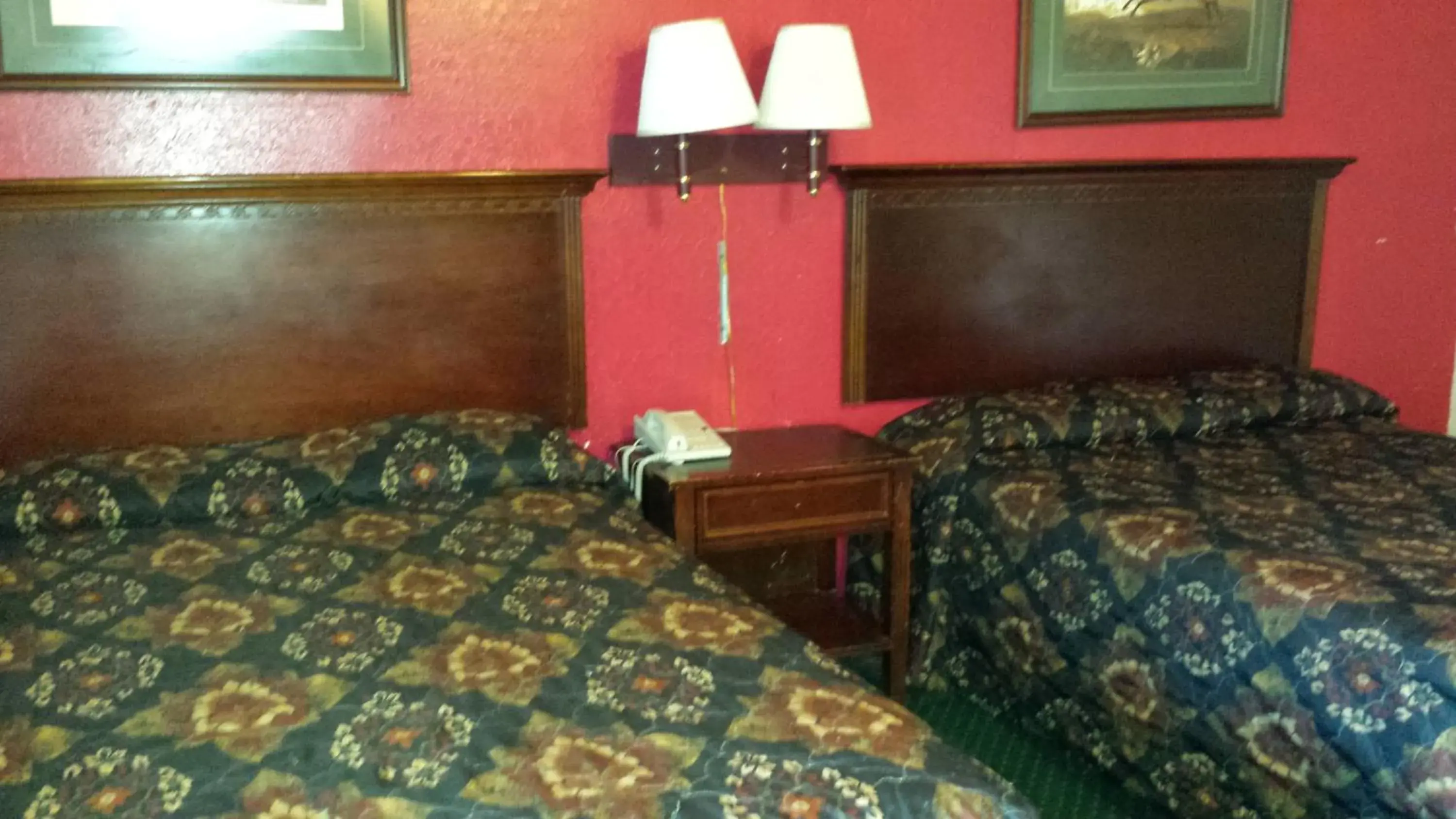 Bed in Hallmark Motel