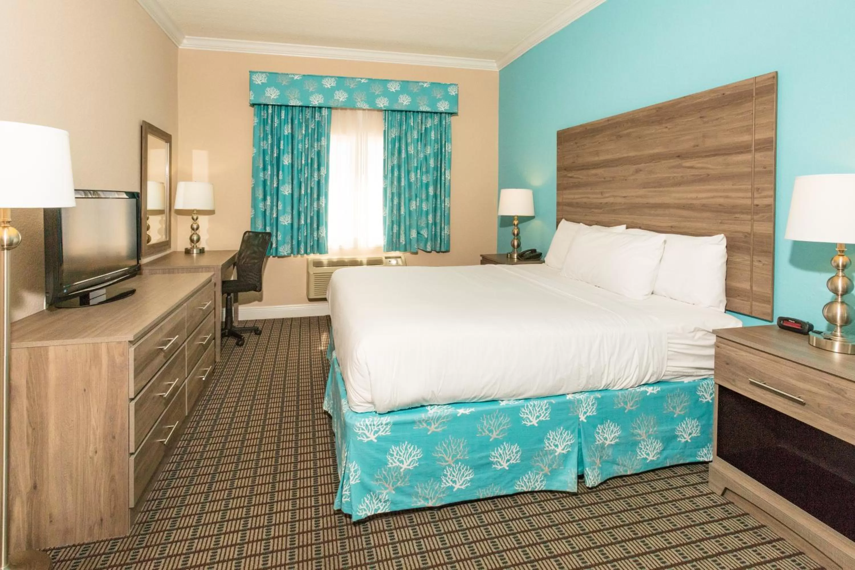 Bed in Amelia Hotel at the Beach