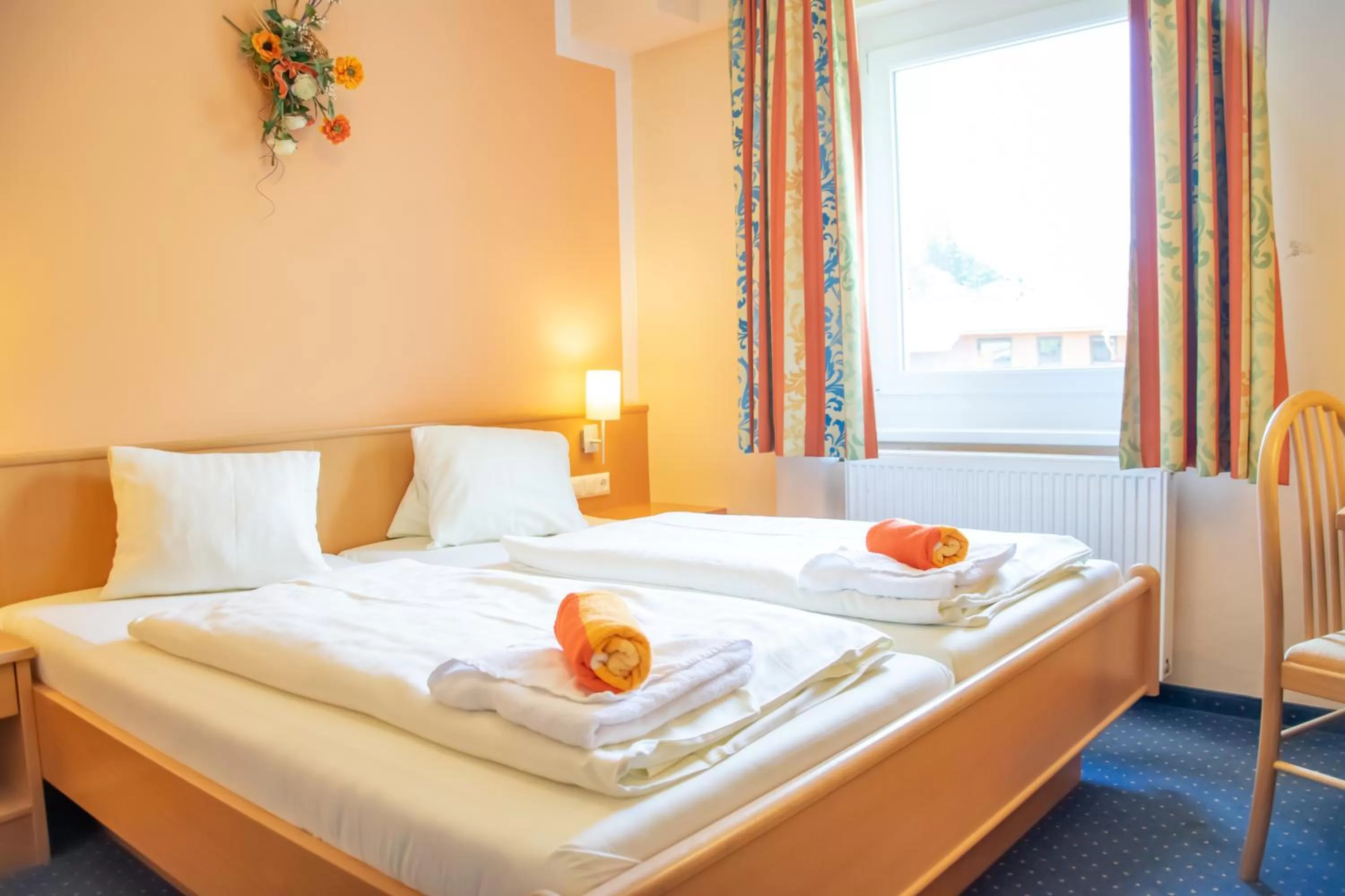 Bed in Strandhotel Burgstaller