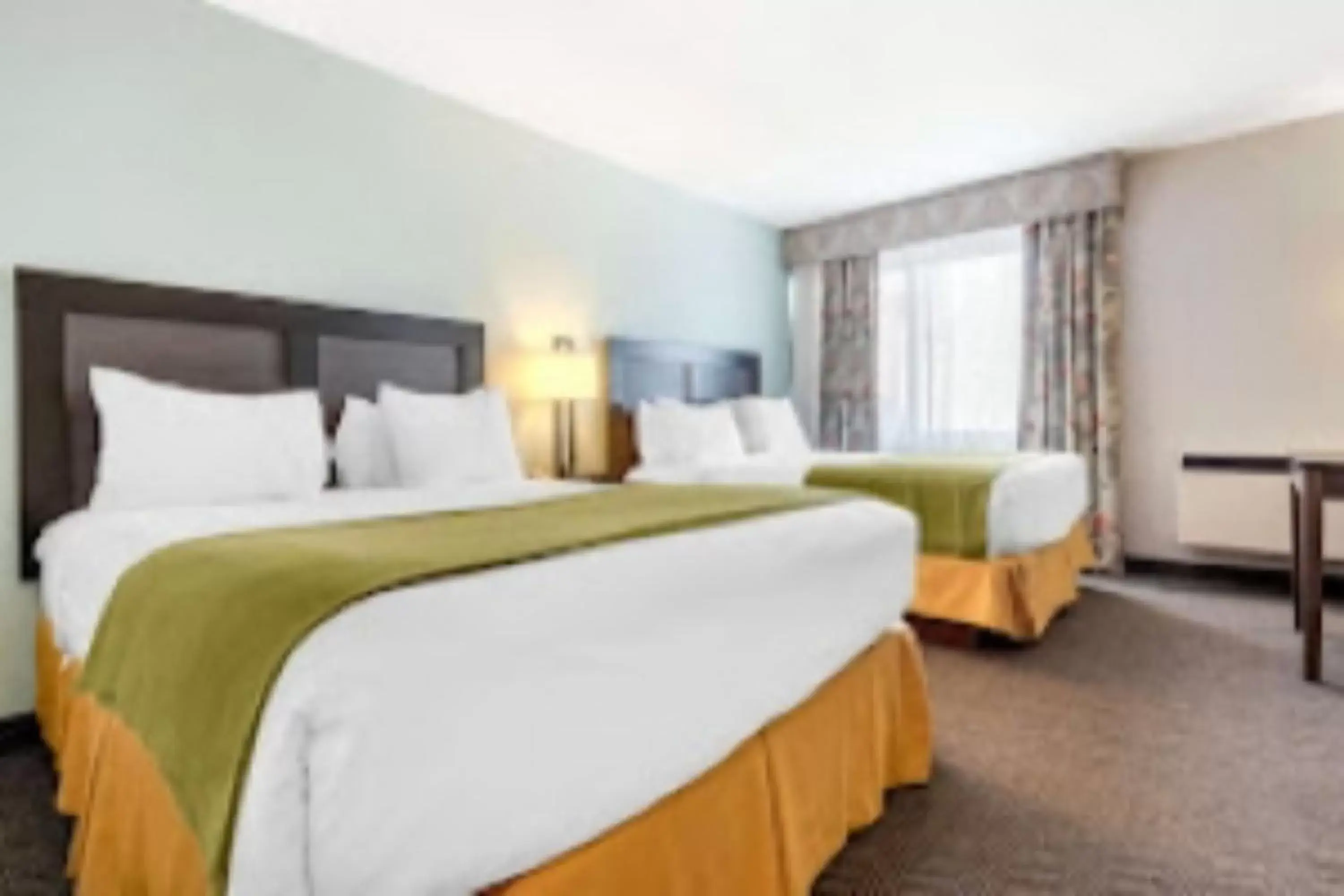 Bed in Quality Inn & Suites Toronto West 401-Dixie
