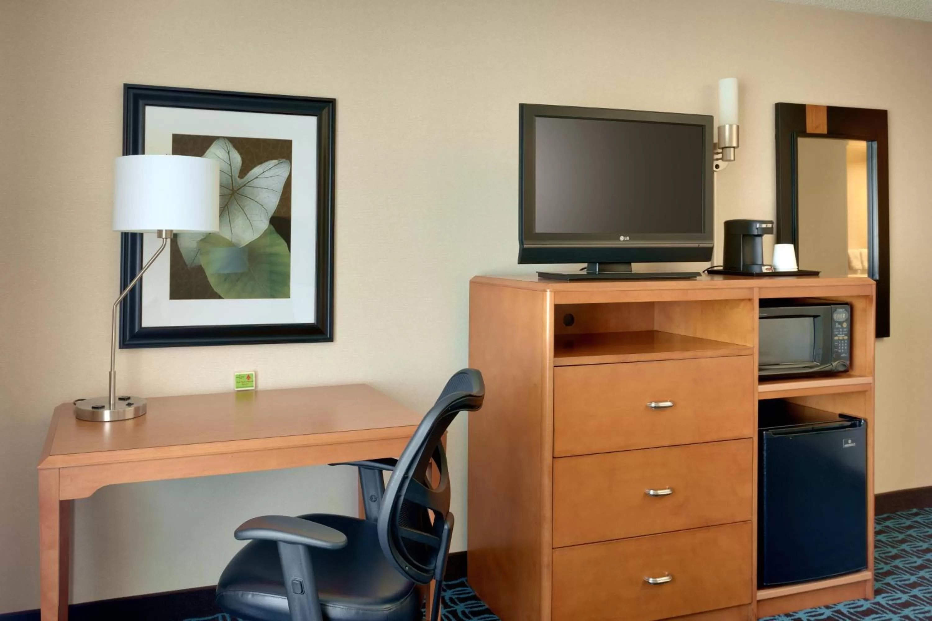 Photo of the whole room, TV/Entertainment Center in Fairfield Inn & Suites Salt Lake City Airport