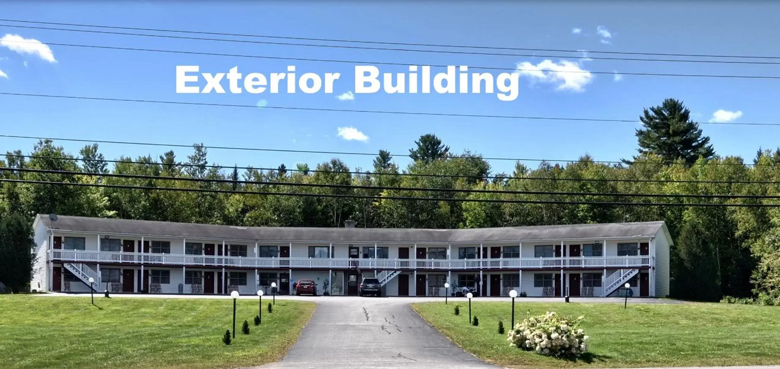 Property building in Cabot Inn & Suites Property building in Cabot Inn & Suites