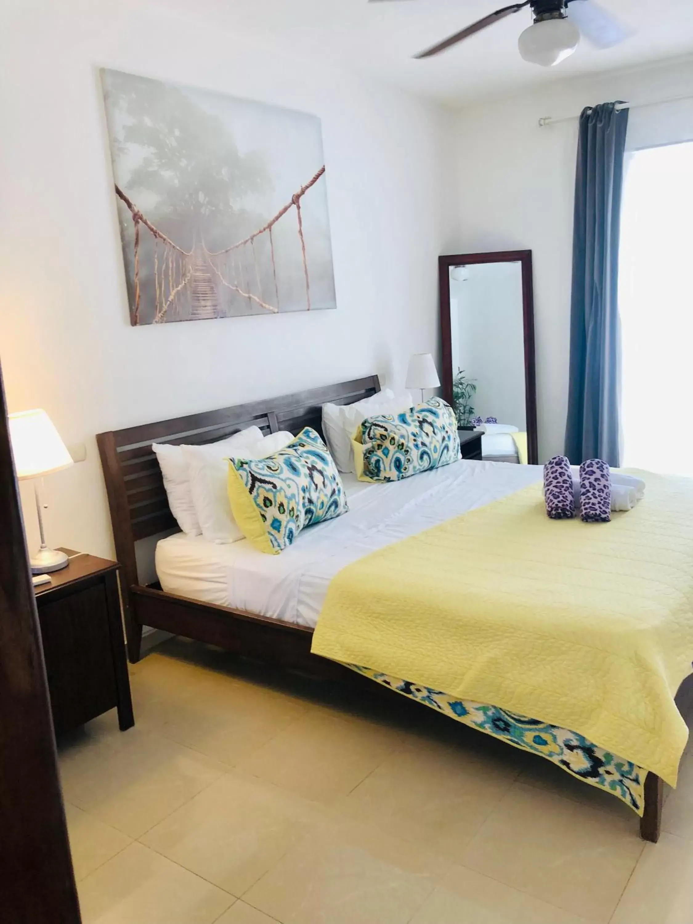 Bed in Los Corales Luxury Villas Beach Club and Spa