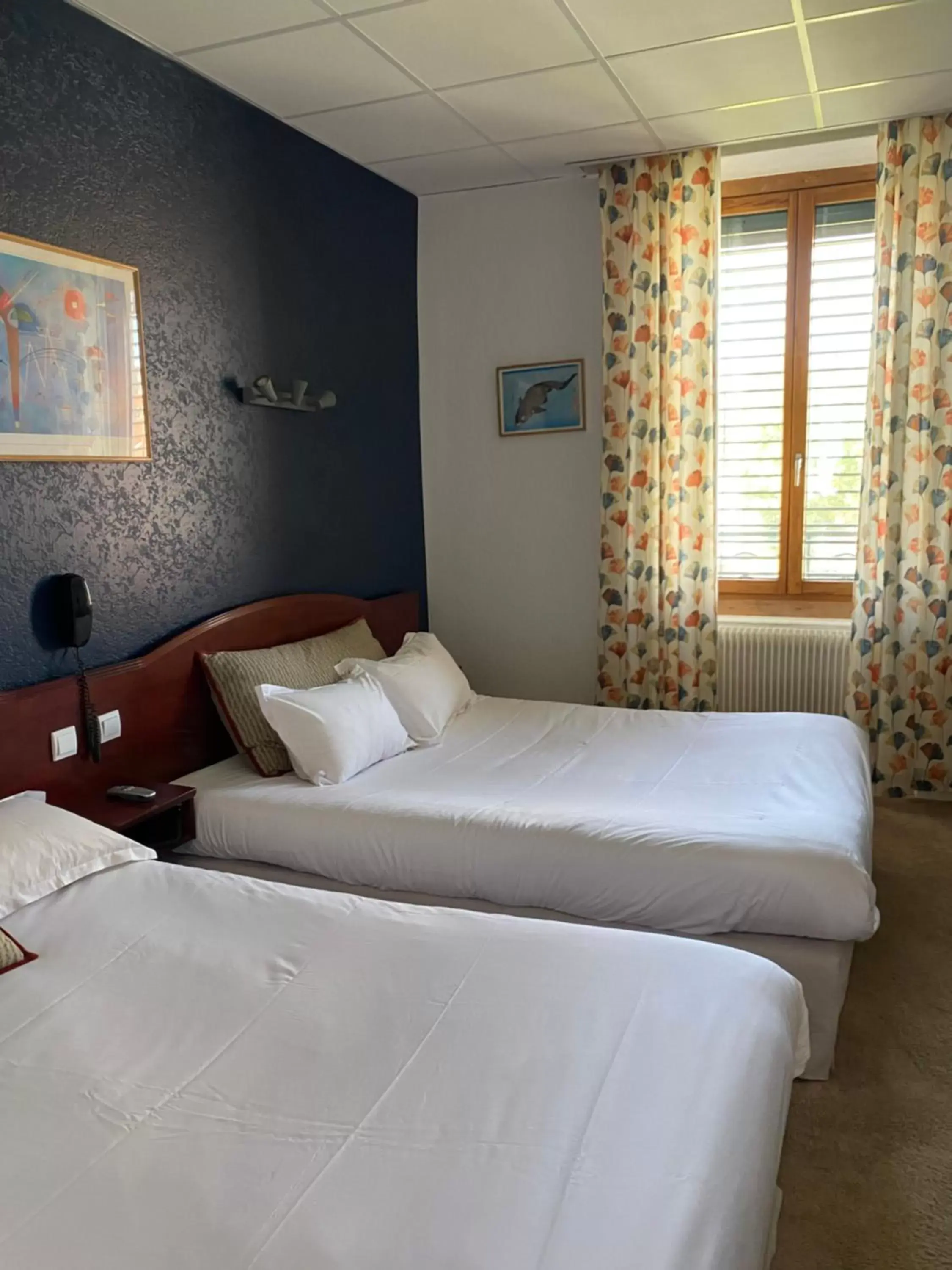 Photo of the whole room, Bed in Grand Hotel De La Poste - Lyon Sud - Vienne