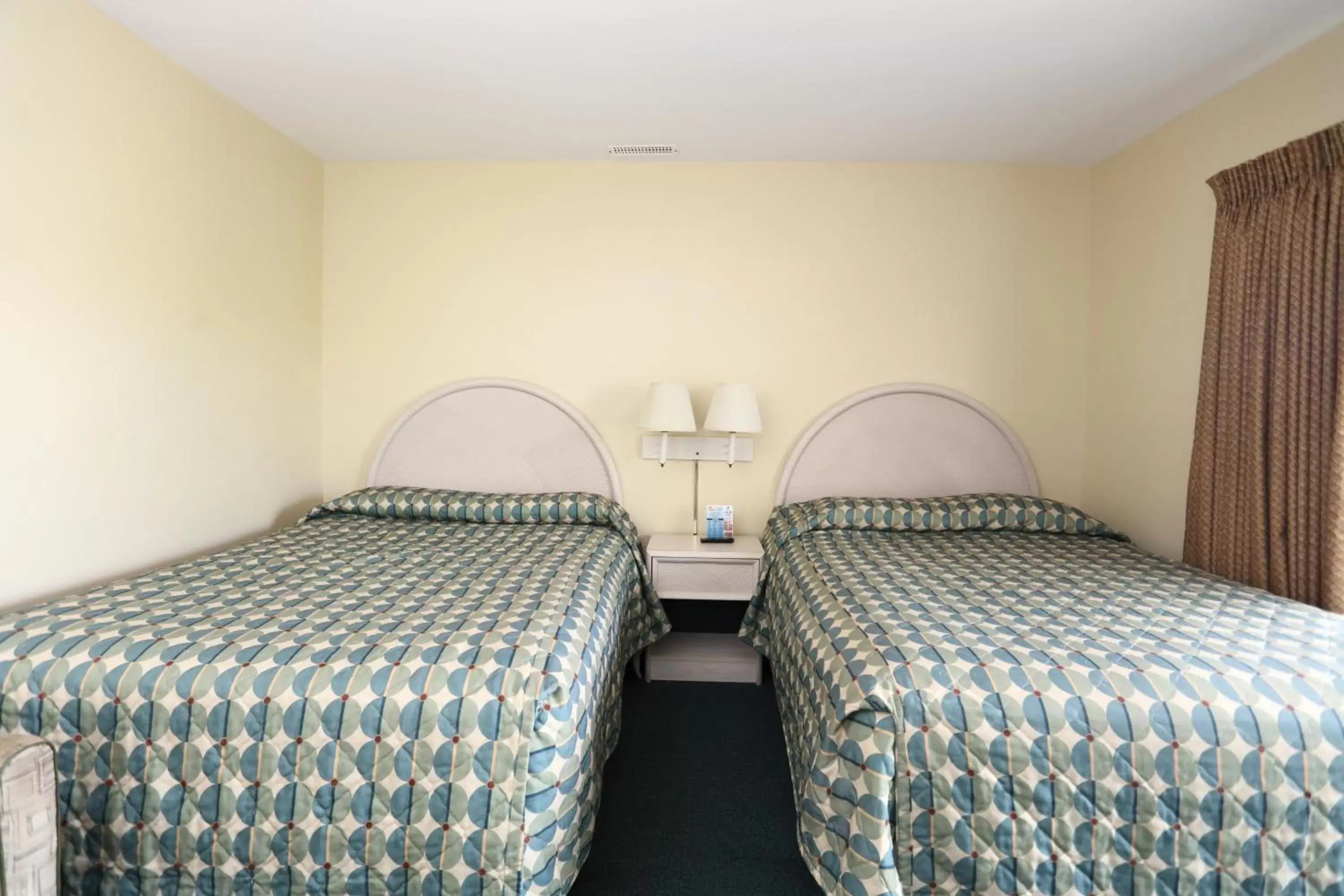 Bed in Riviera Resort & Suites
