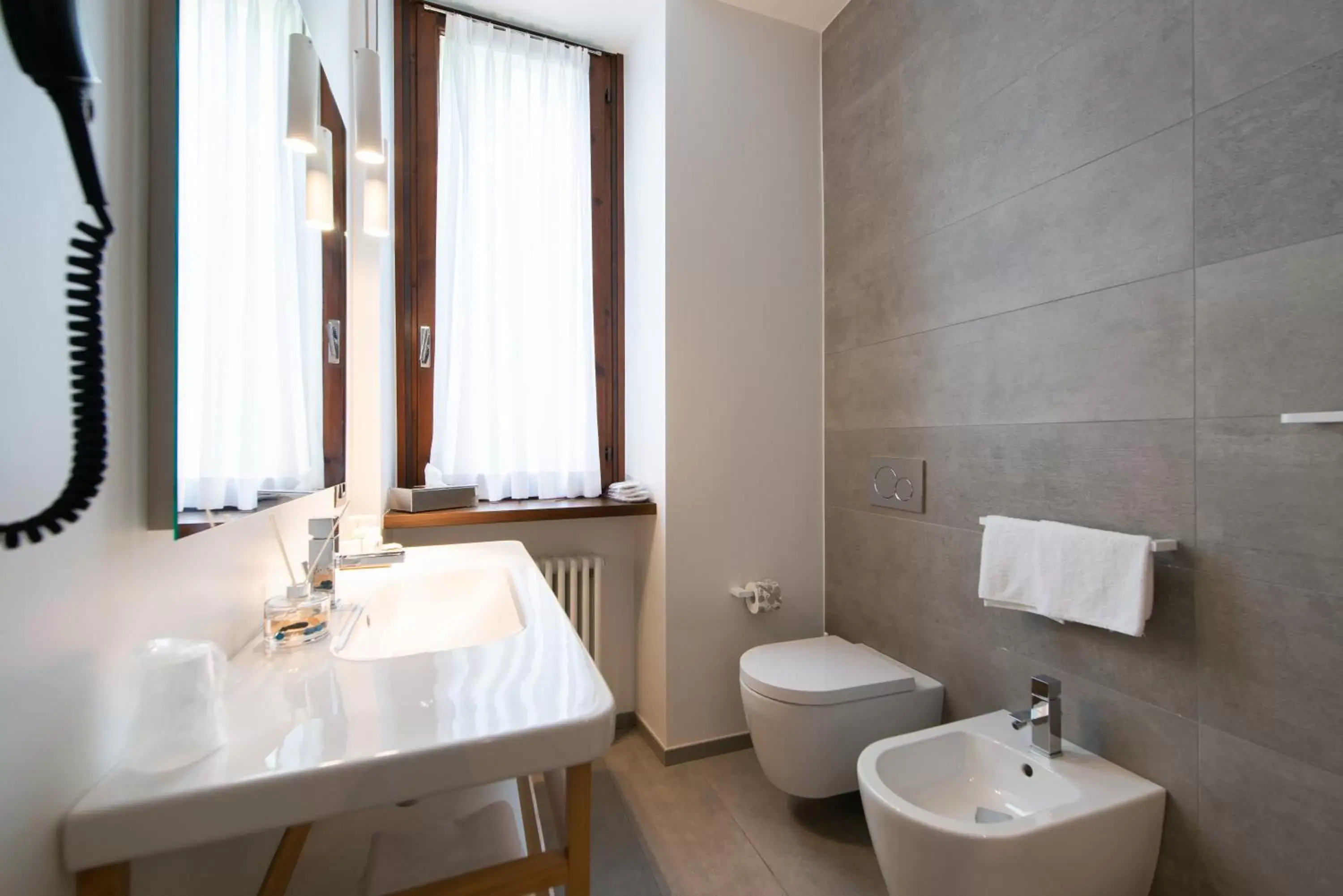 Toilet, Bathroom in Le Funi Hotel