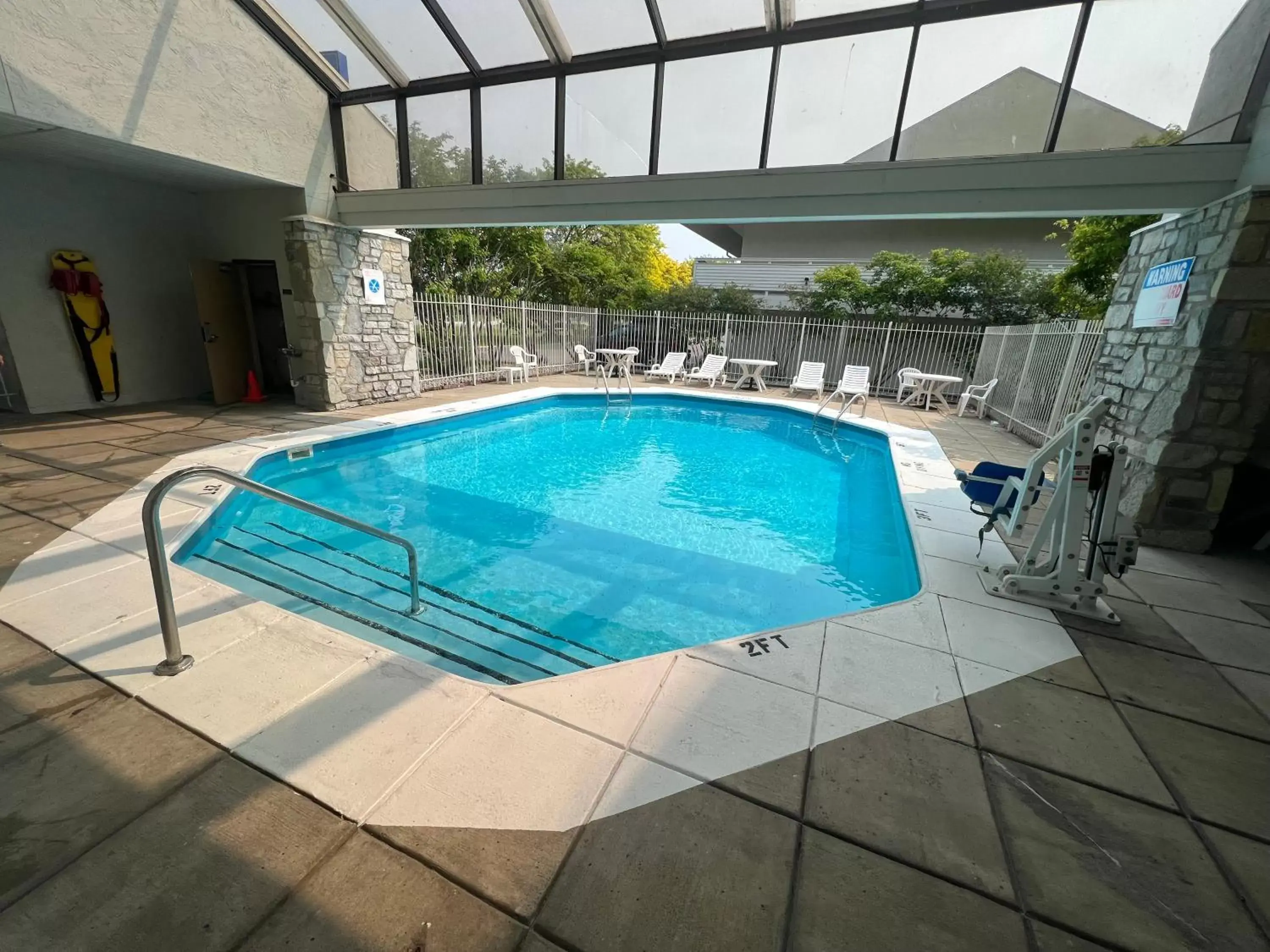 Patio, Swimming Pool in Days Inn & Suites by Wyndham Monroe