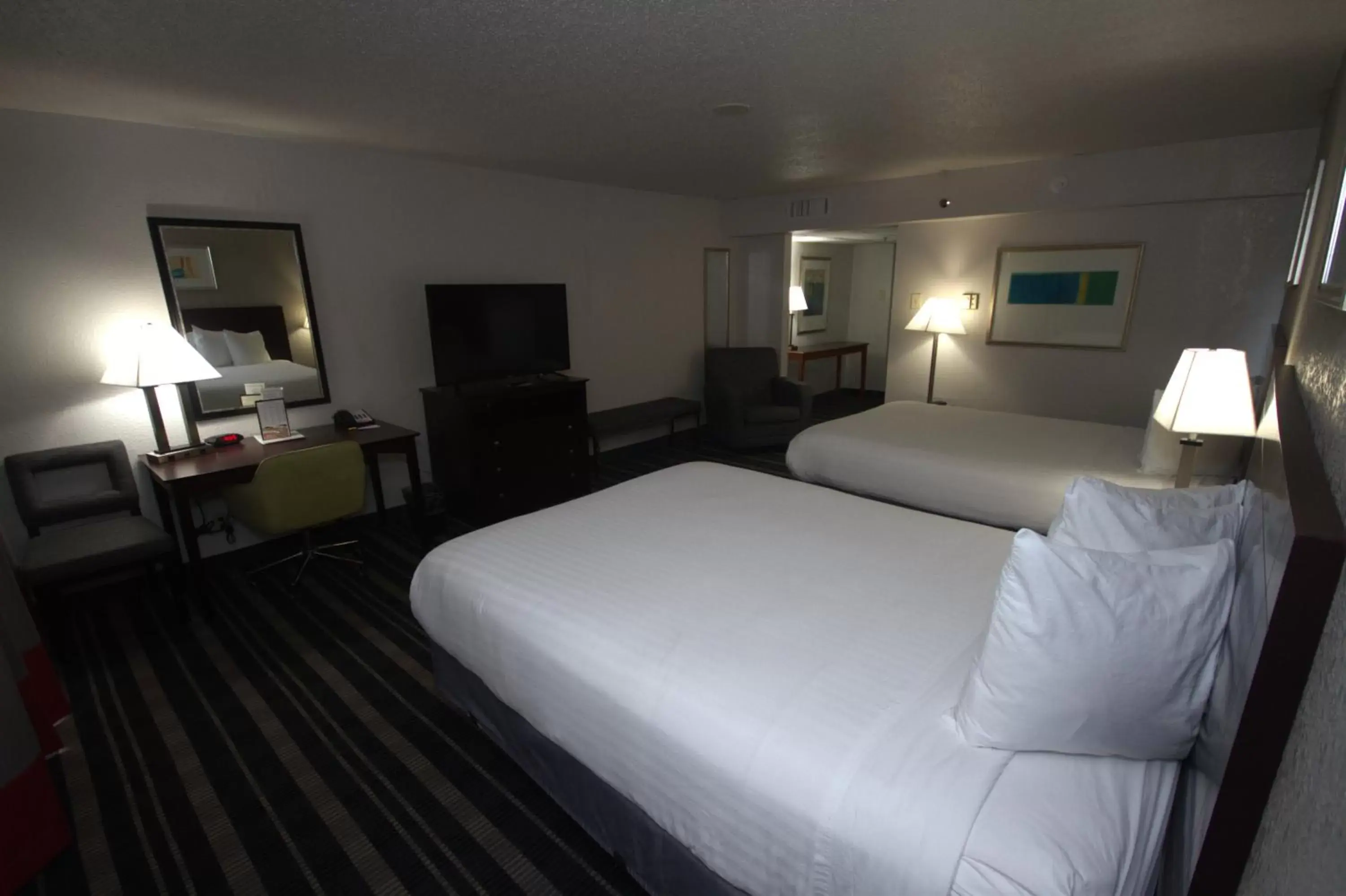 Bedroom, Bed in Atrium Hotel and Suites DFW Airport