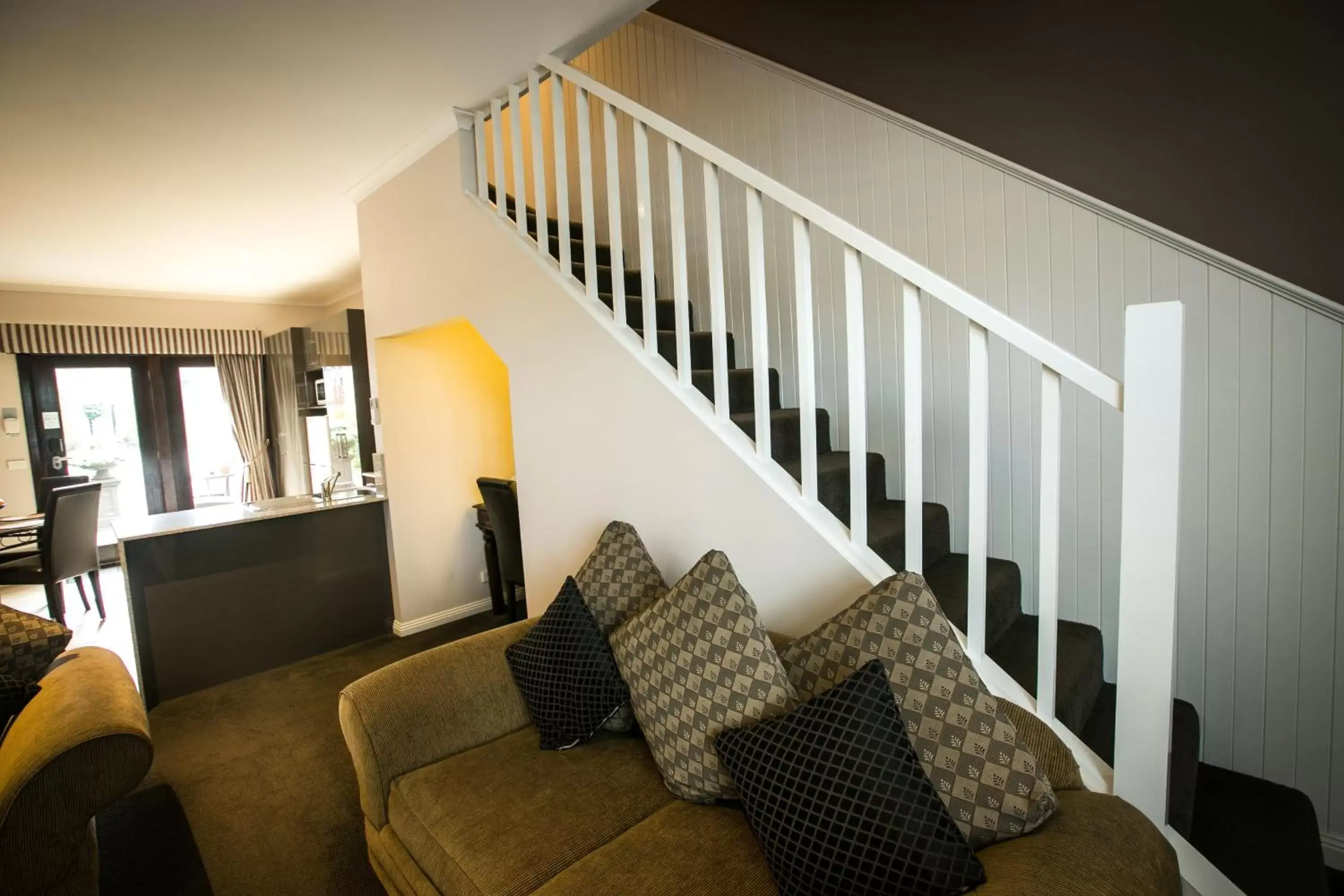 Bedroom, Seating Area in Gallery Apartments