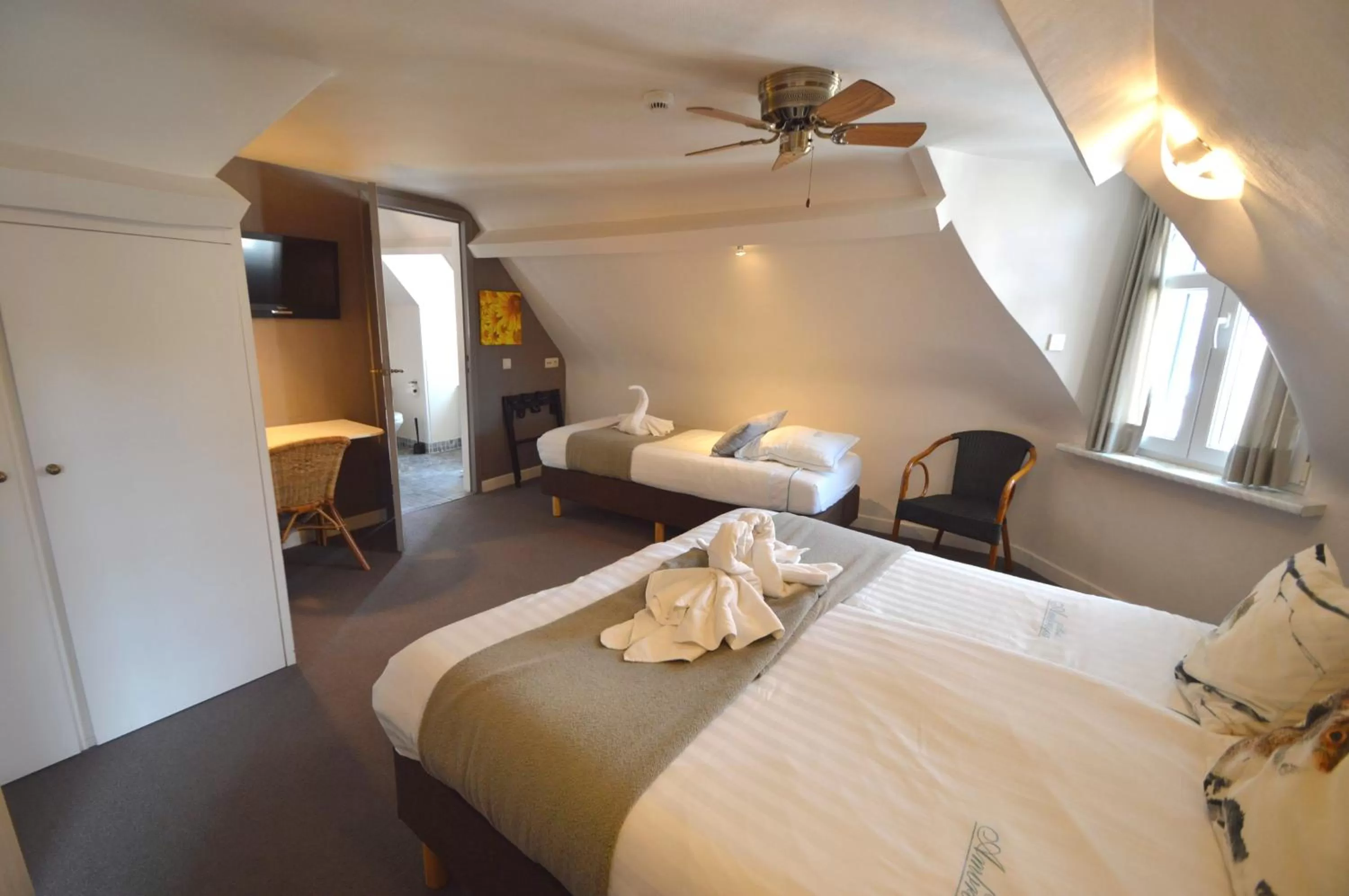 Bed in Hotel Ambrosia