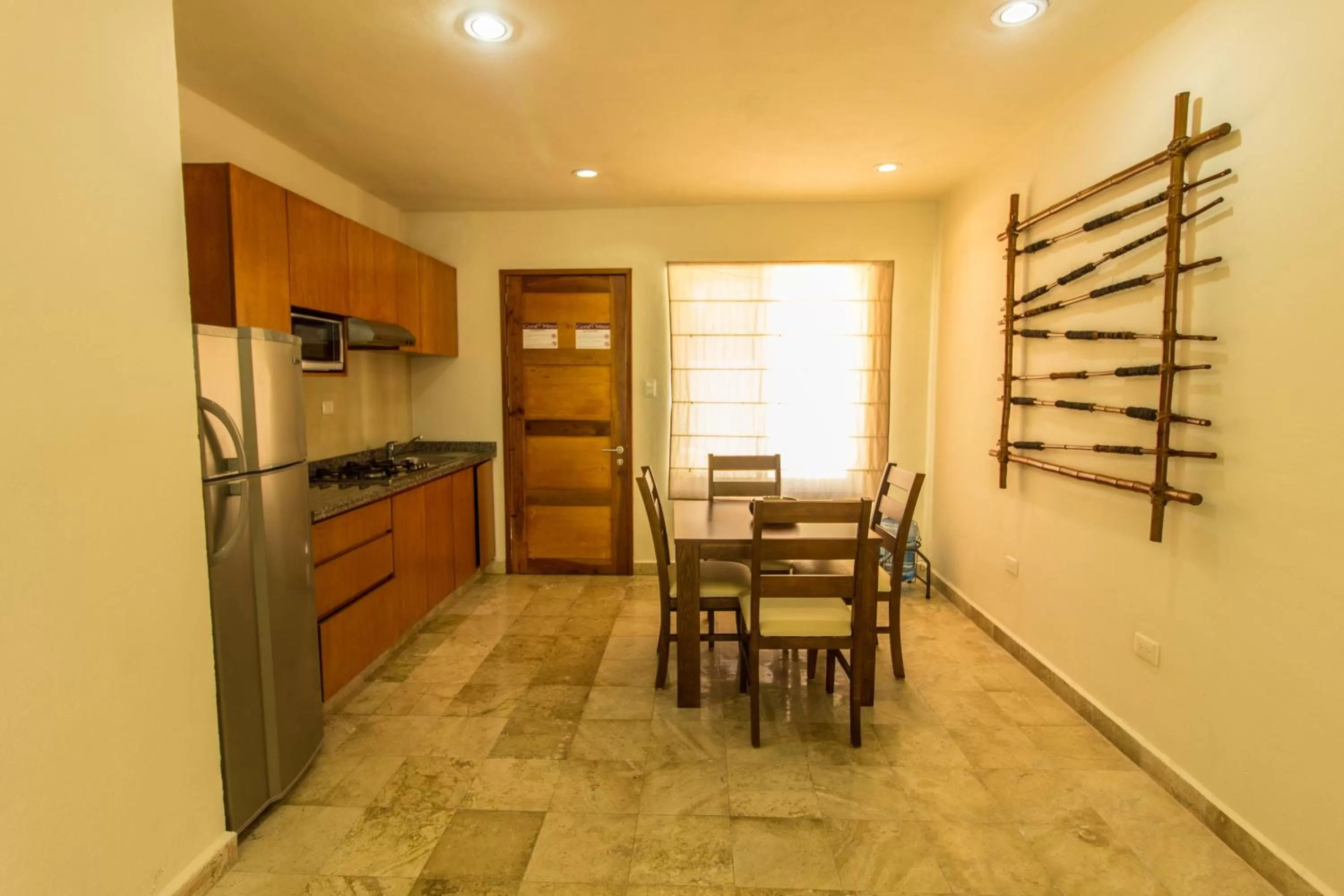 Kitchen or kitchenette in Coral Maya Stay Suites