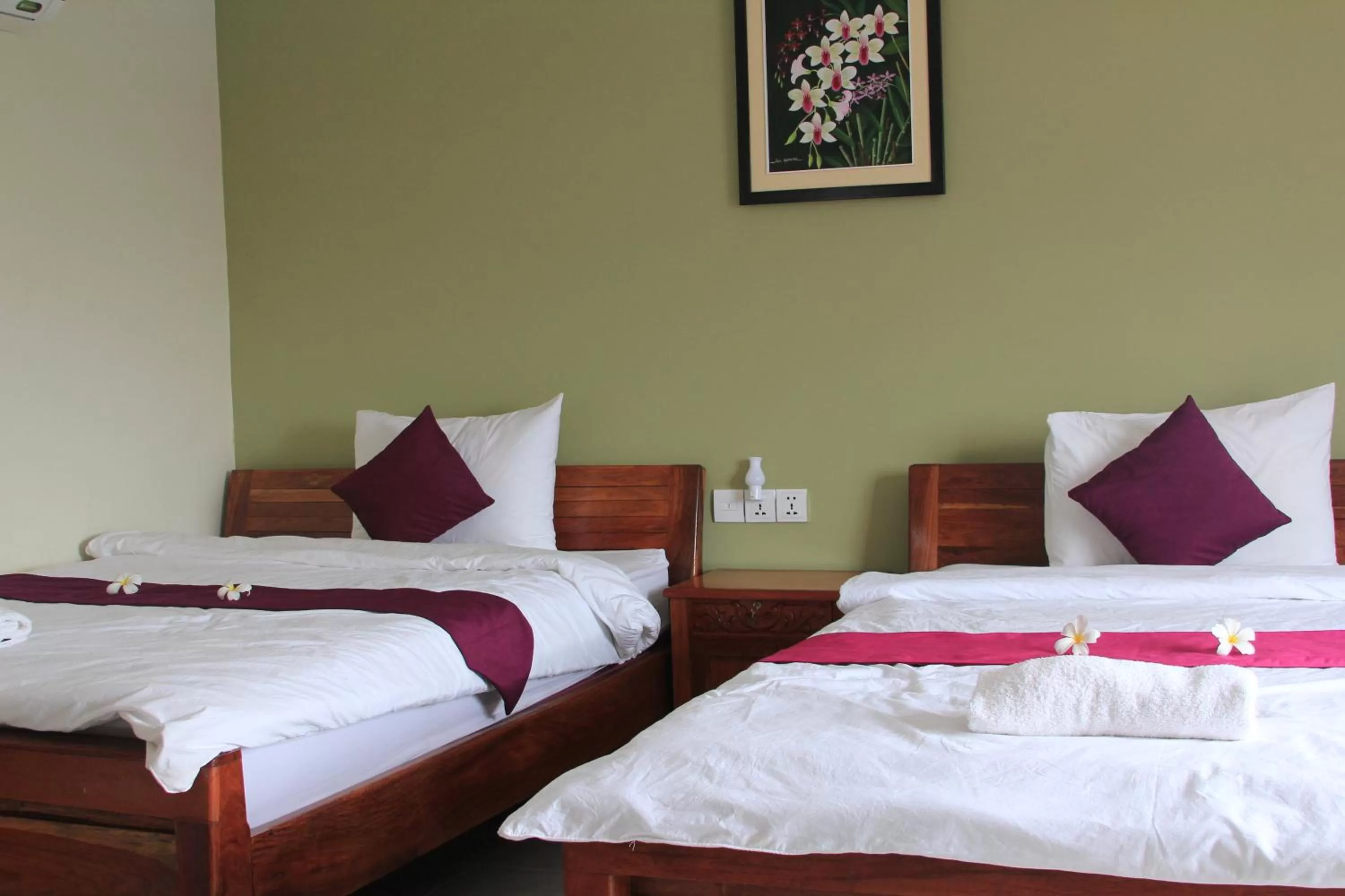 Bed in Neakru Guesthouse and Restaurant