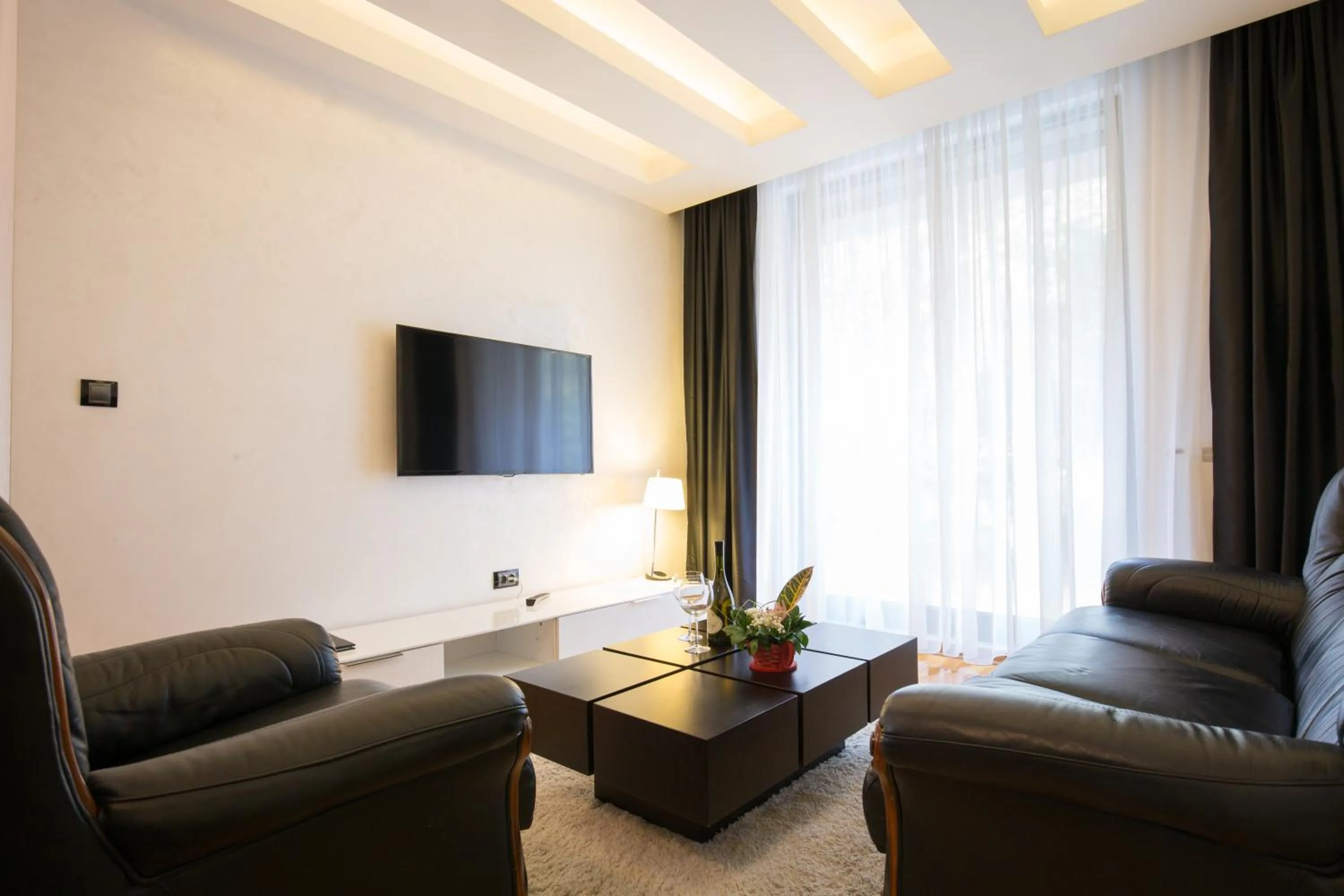 TV and multimedia in Nova City Garni Hotel Signature Collection