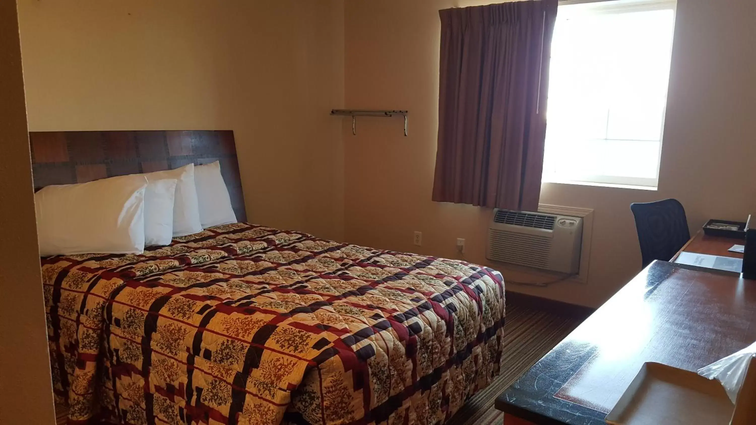 Bed in Knights Inn and Suites - Grand Forks