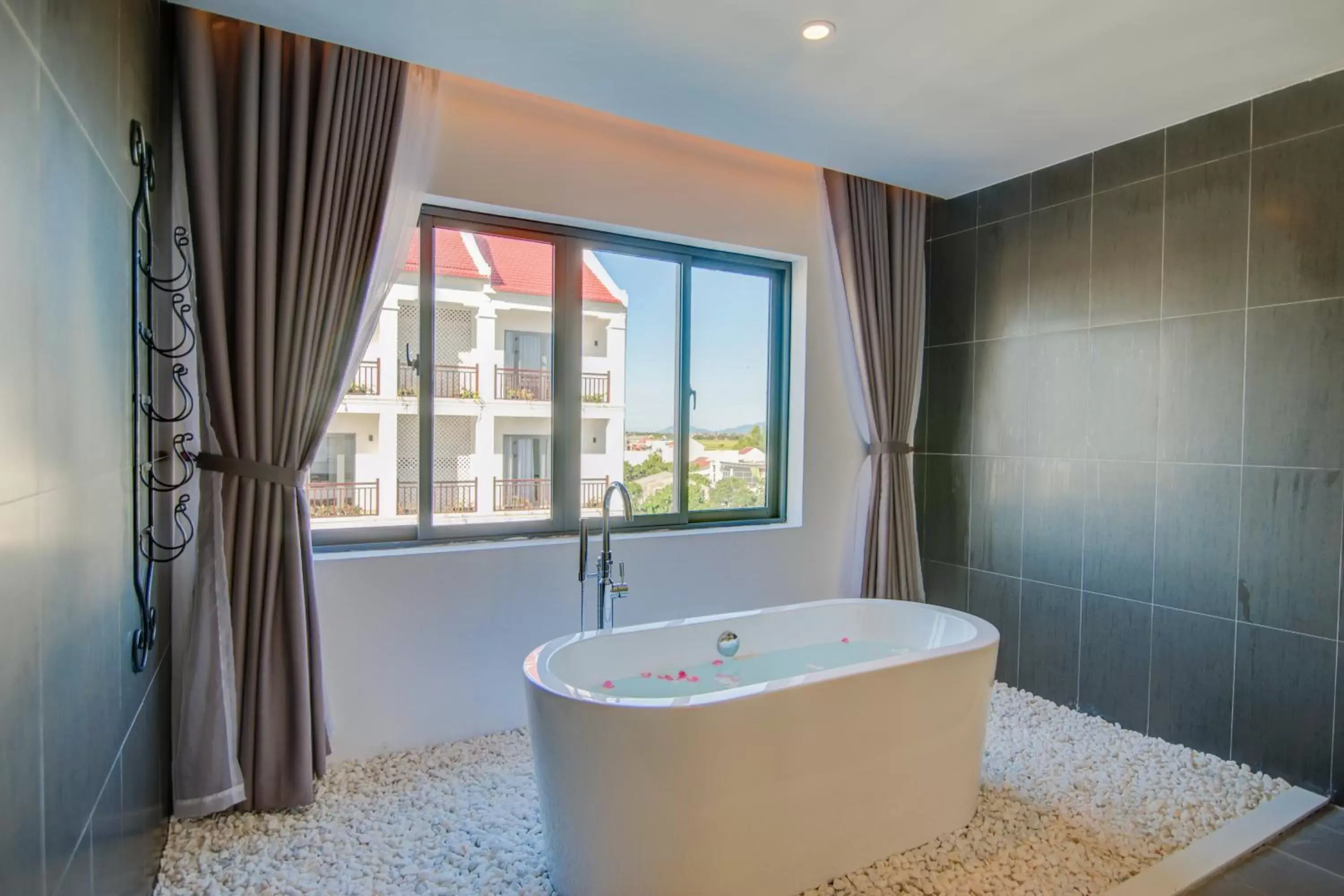 Bathroom in Golden Pearl Hoi An Hotel