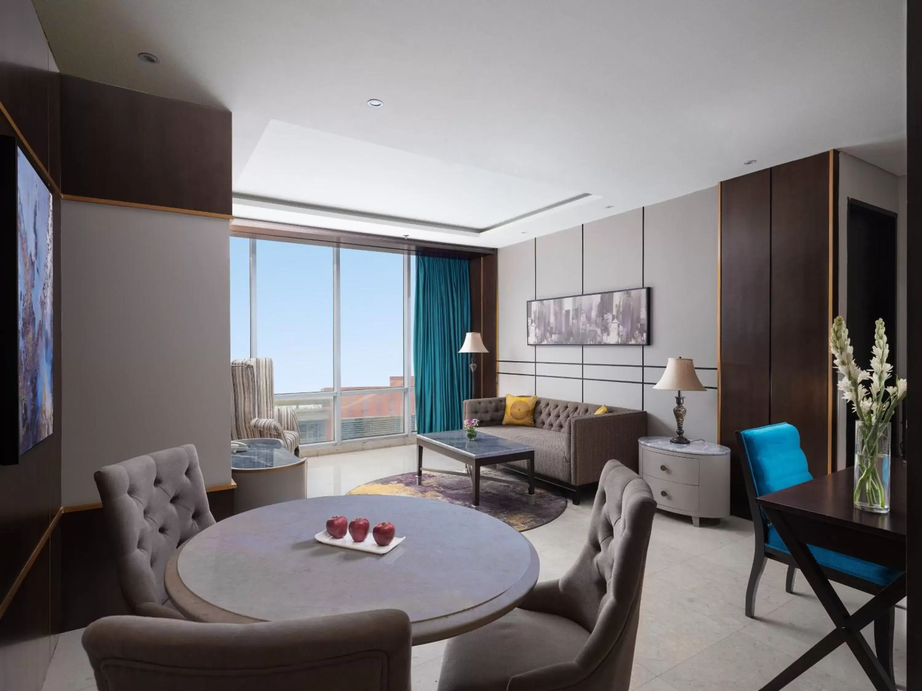 Living room, Dining Area in The Grove Suites by GRAND ASTON