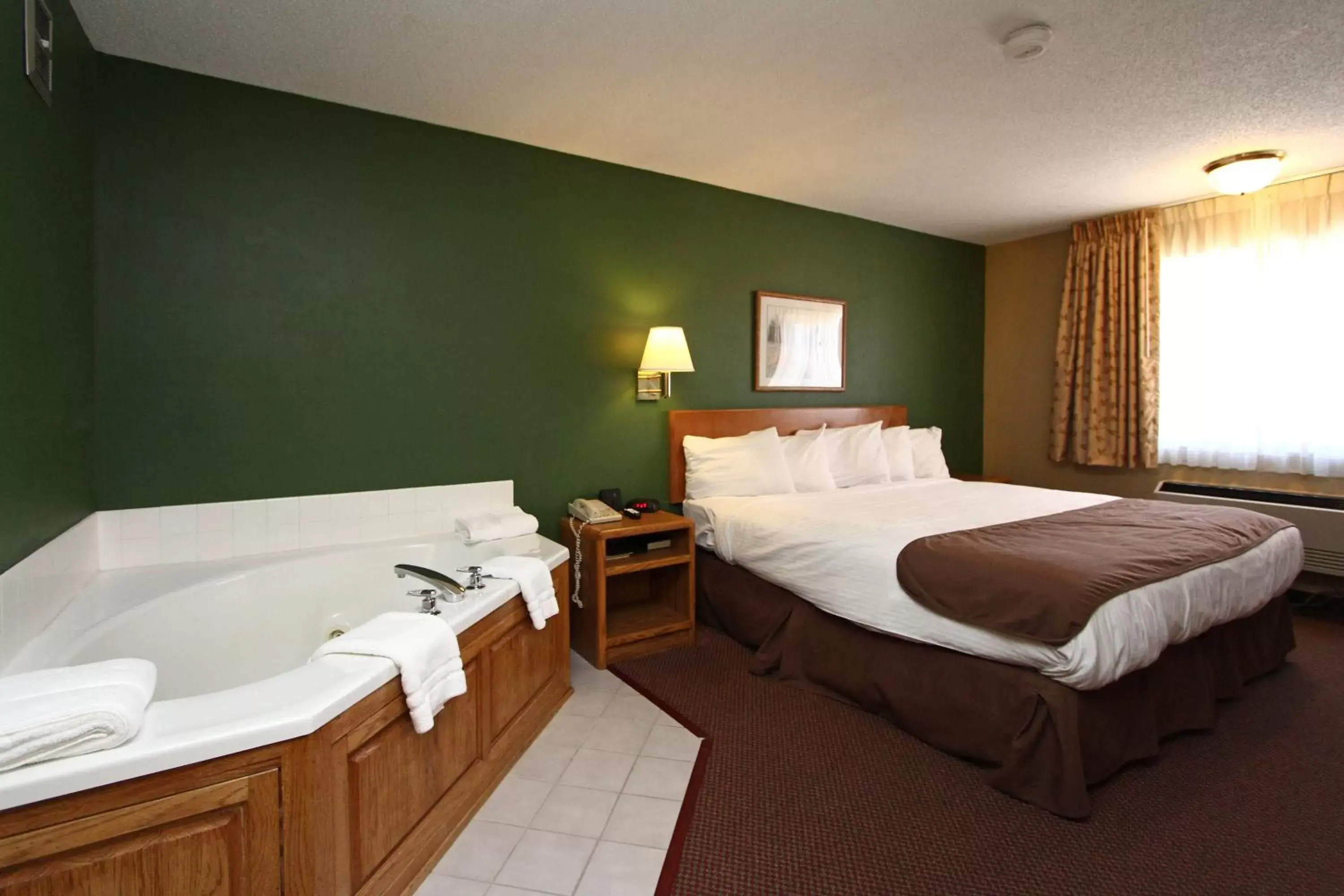 Bedroom, Bed in New Victorian Inn & Suites Kearney