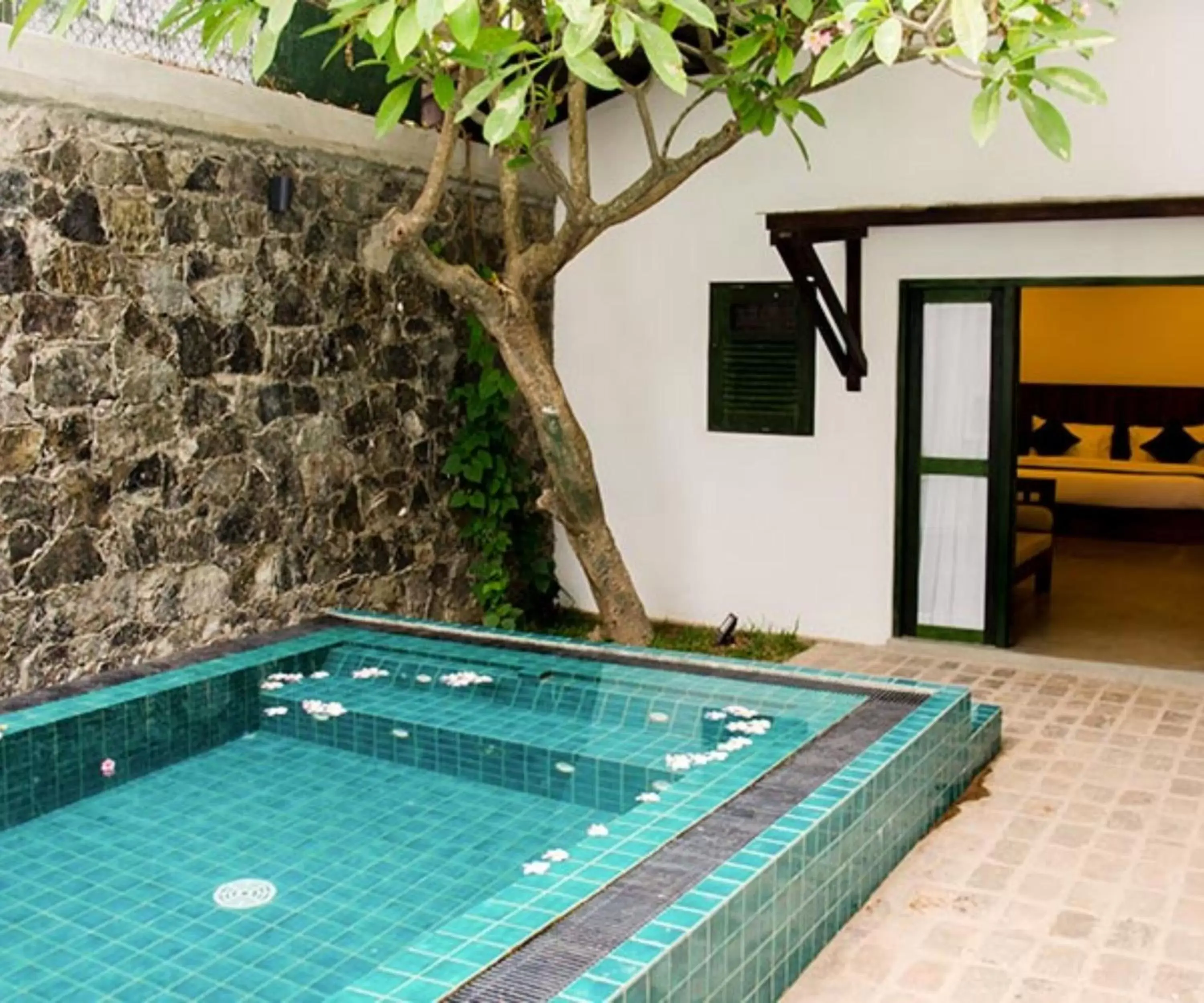 Bed, Swimming Pool in Regenta Arie Lagoon Negombo