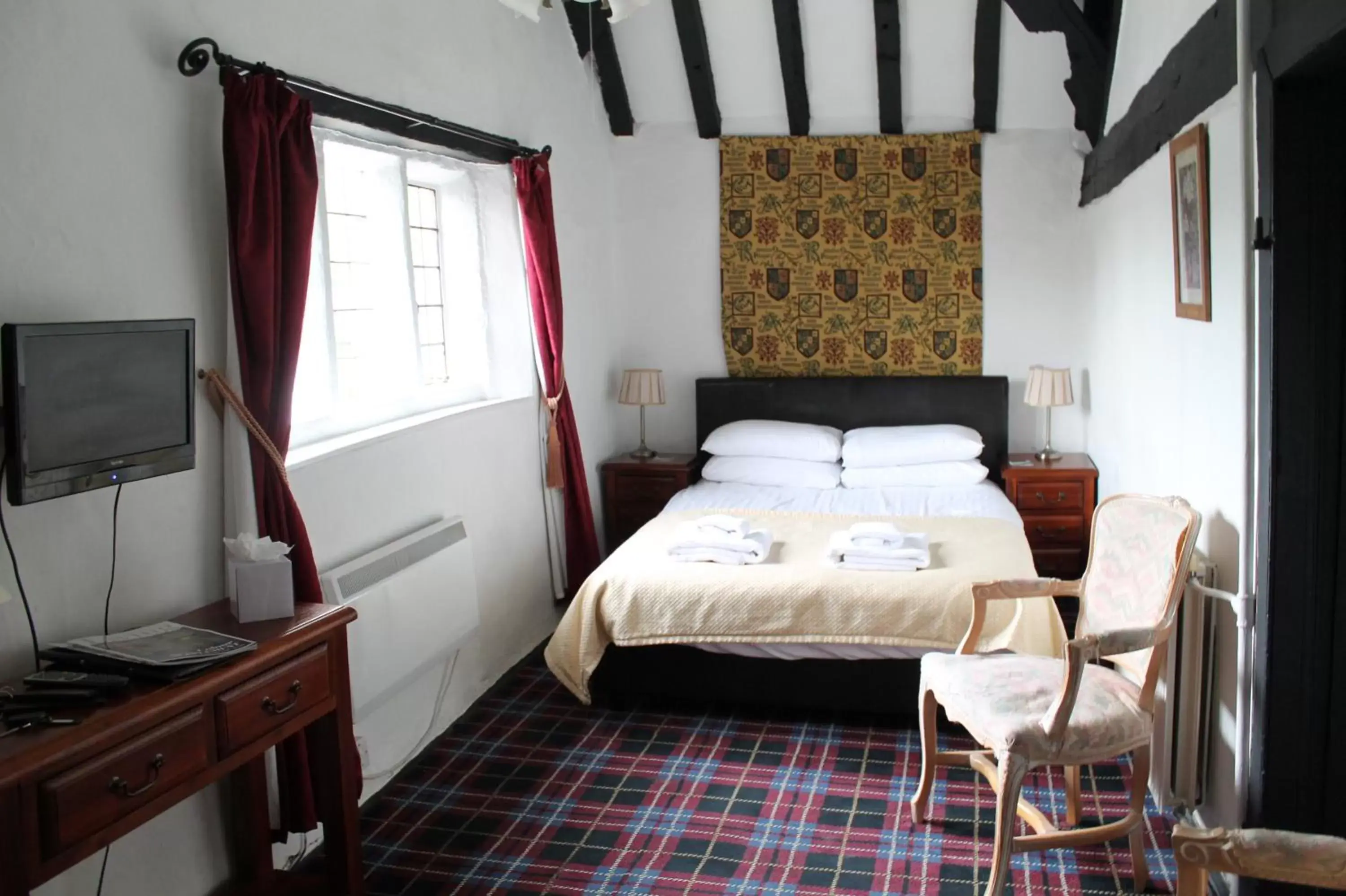 Photo of the whole room, Bed in Old Court Hotel & Suites