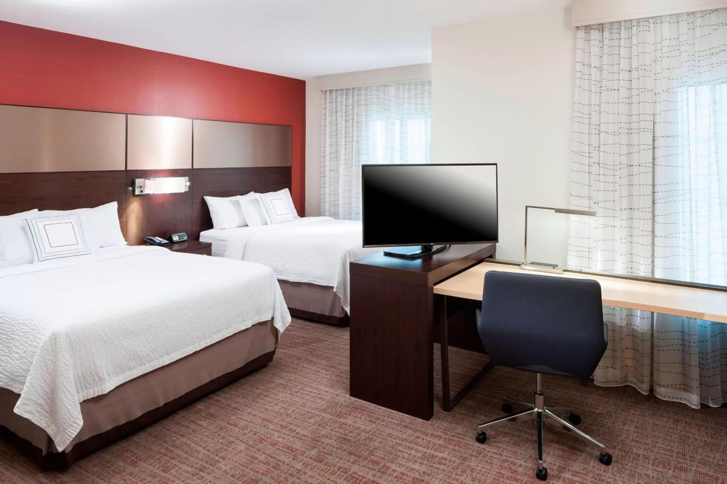 Photo of the whole room, TV/Entertainment Center in Residence Inn by Marriott Near Universal Orlando