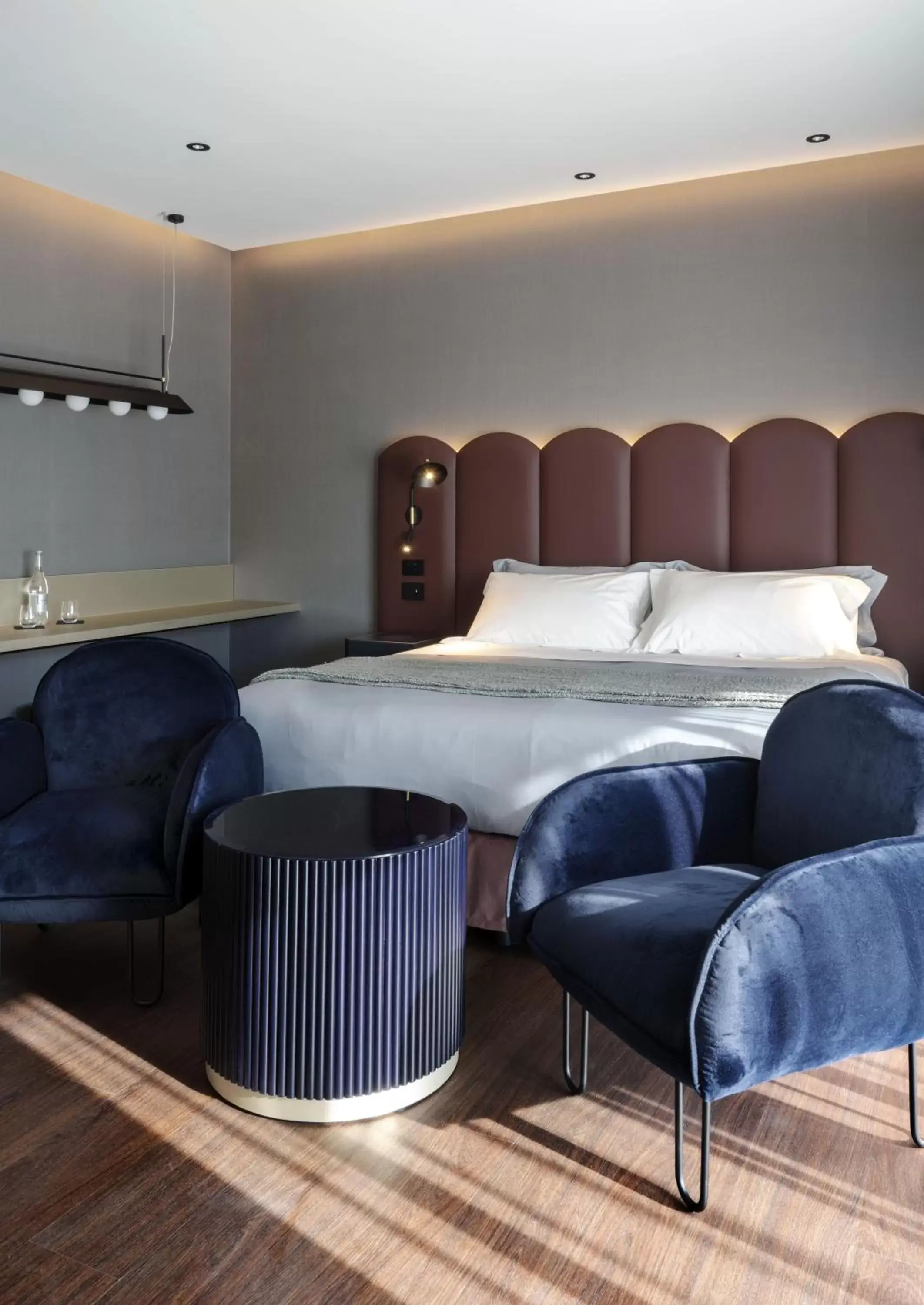 Bed, Seating Area in La Suite Matera Hotel & Spa