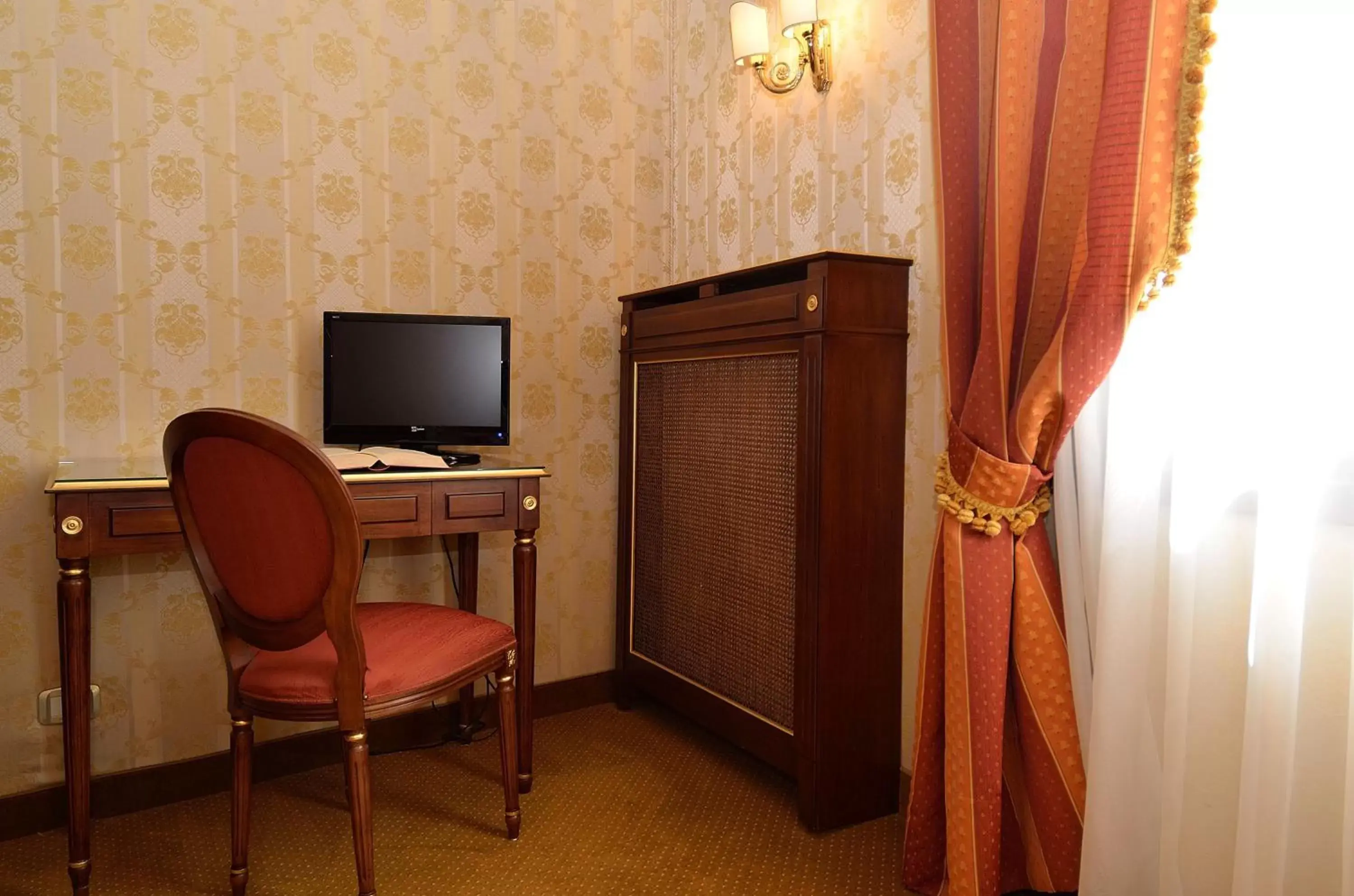 TV and multimedia, TV/Entertainment Center in Locanda La Corte