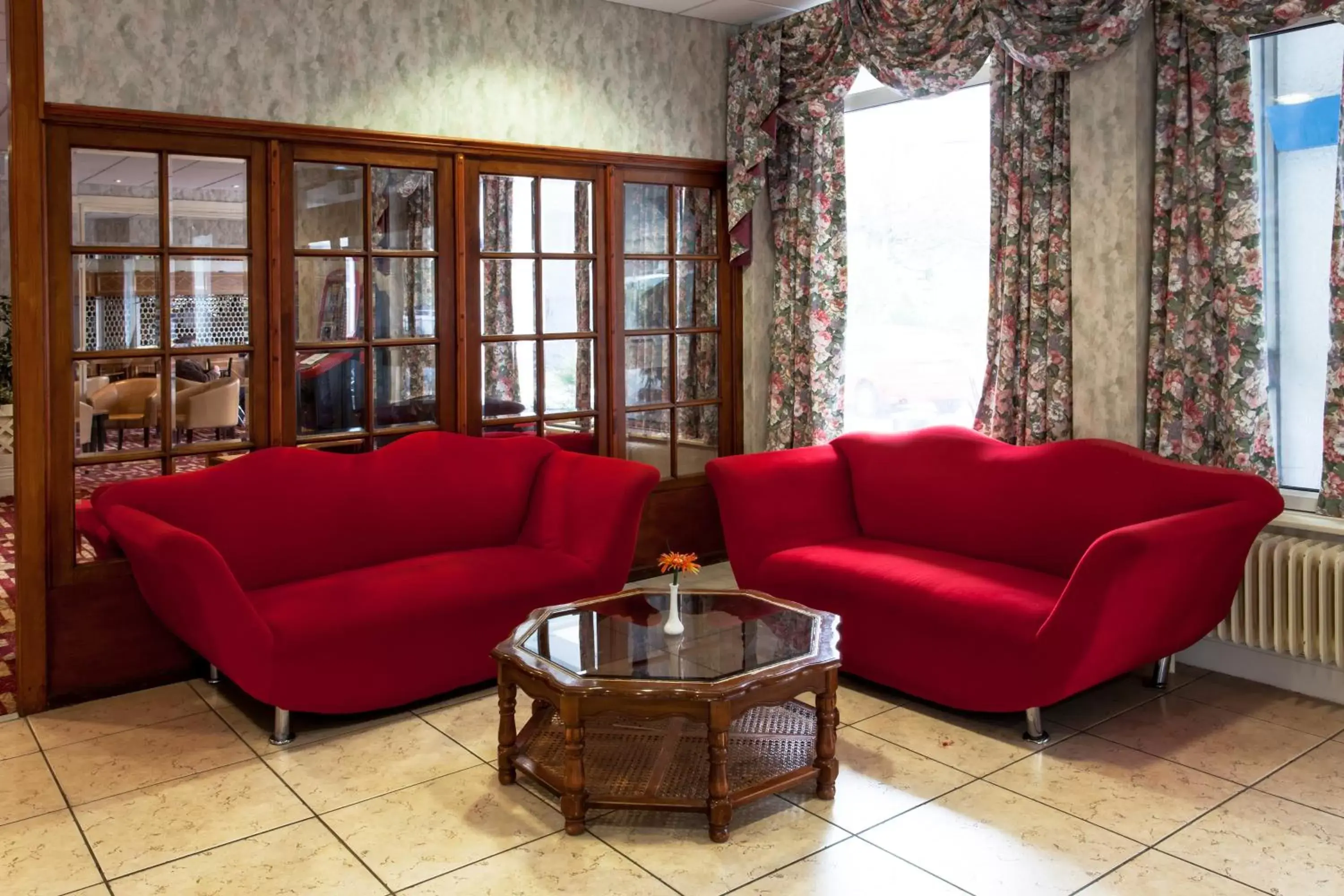 Communal lounge/ TV room, Seating Area in Heathlands Hotel