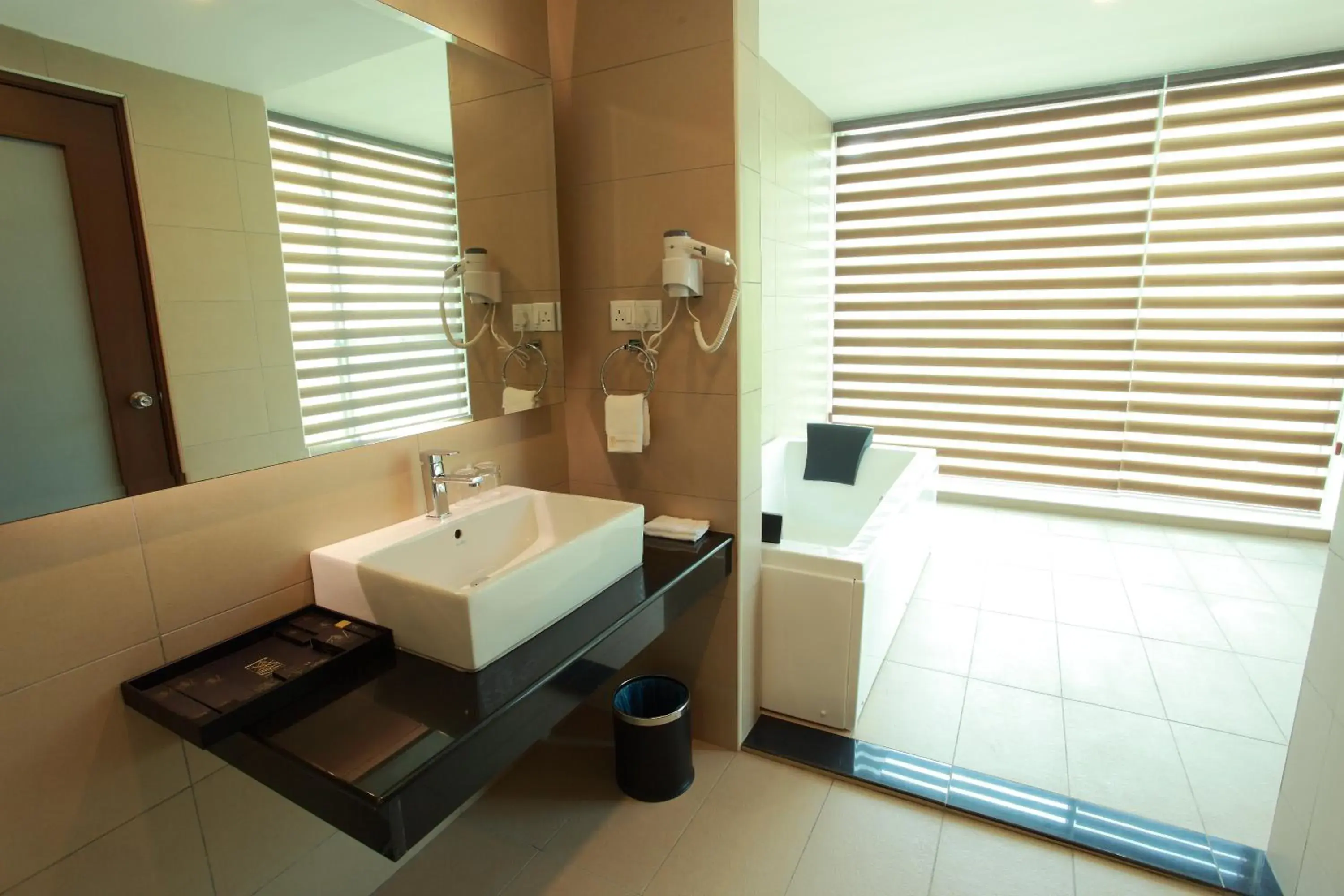 Day, Bathroom in Symphony Suites Hotel
