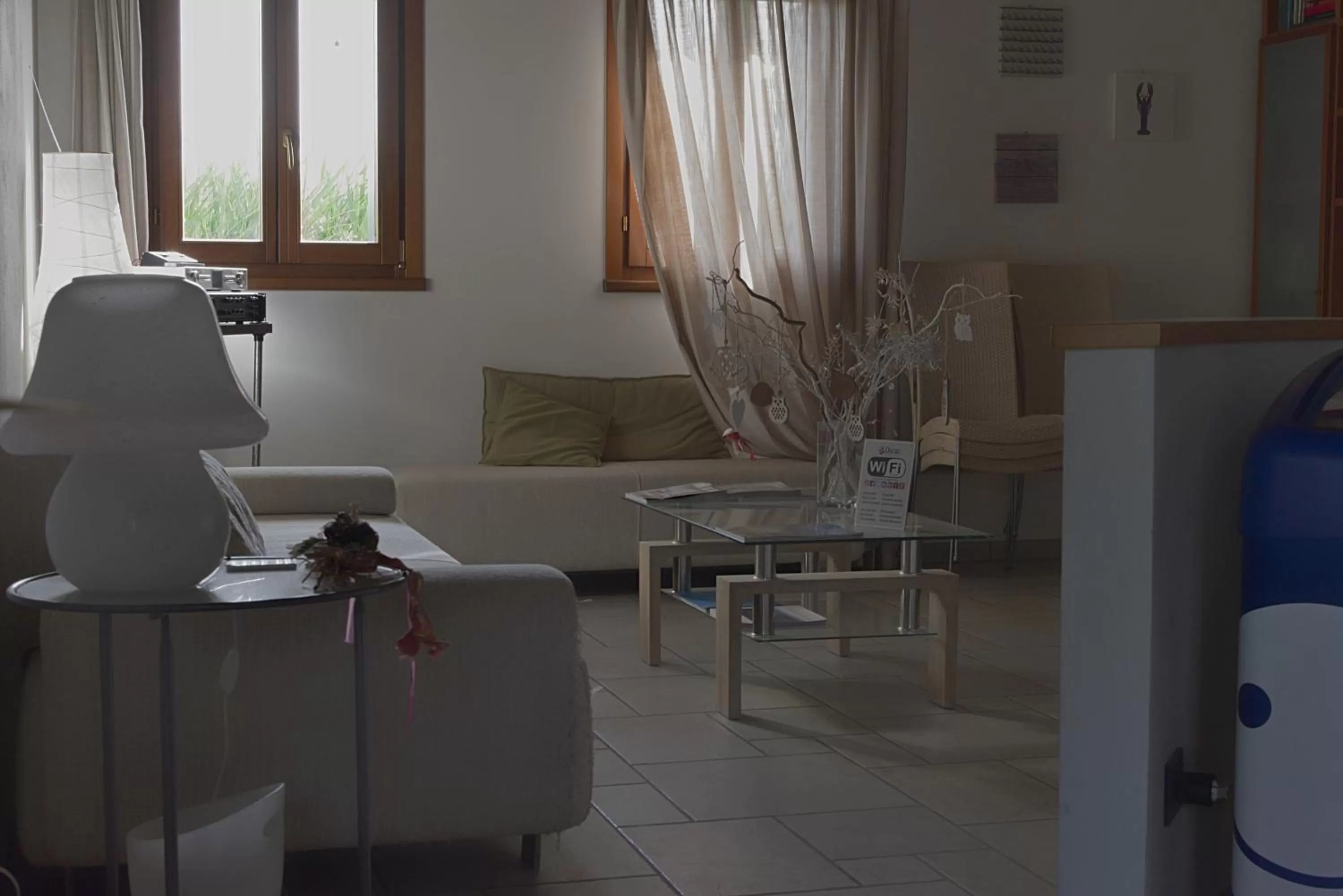 Communal lounge/ TV room in Il Milione Country Hotel