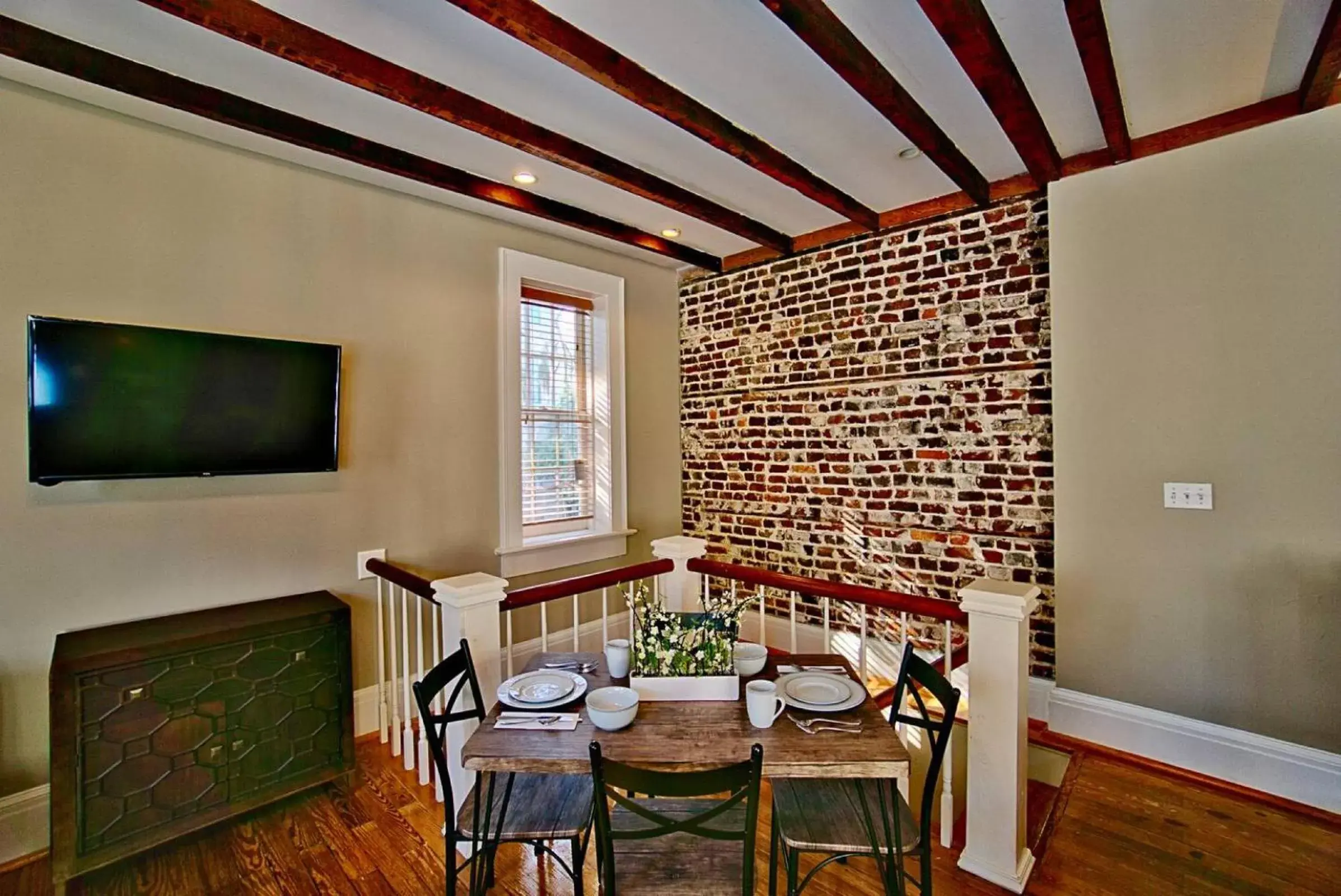 Dining Area in Comfy Carriage House Steps from the River
