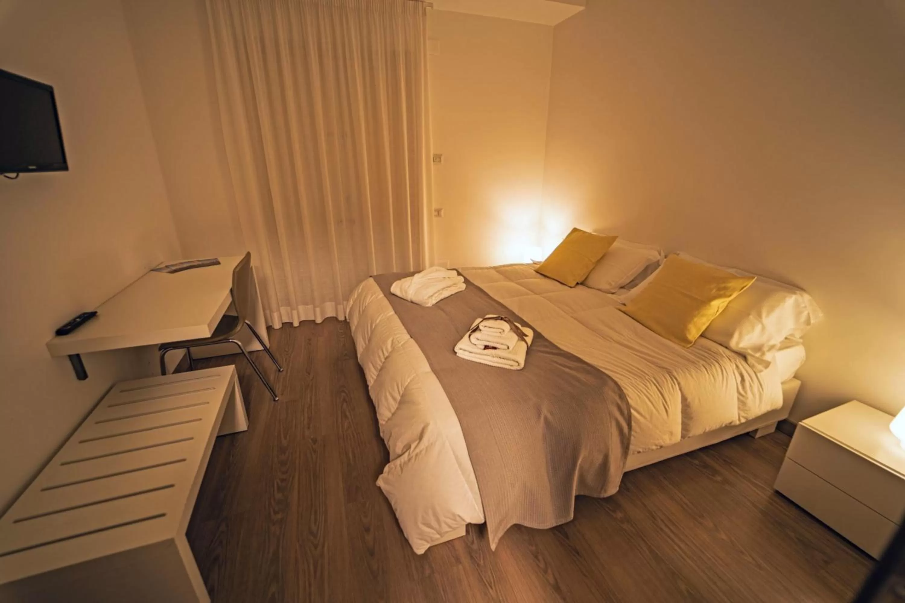 Bed in Hotel Cave Del Sole