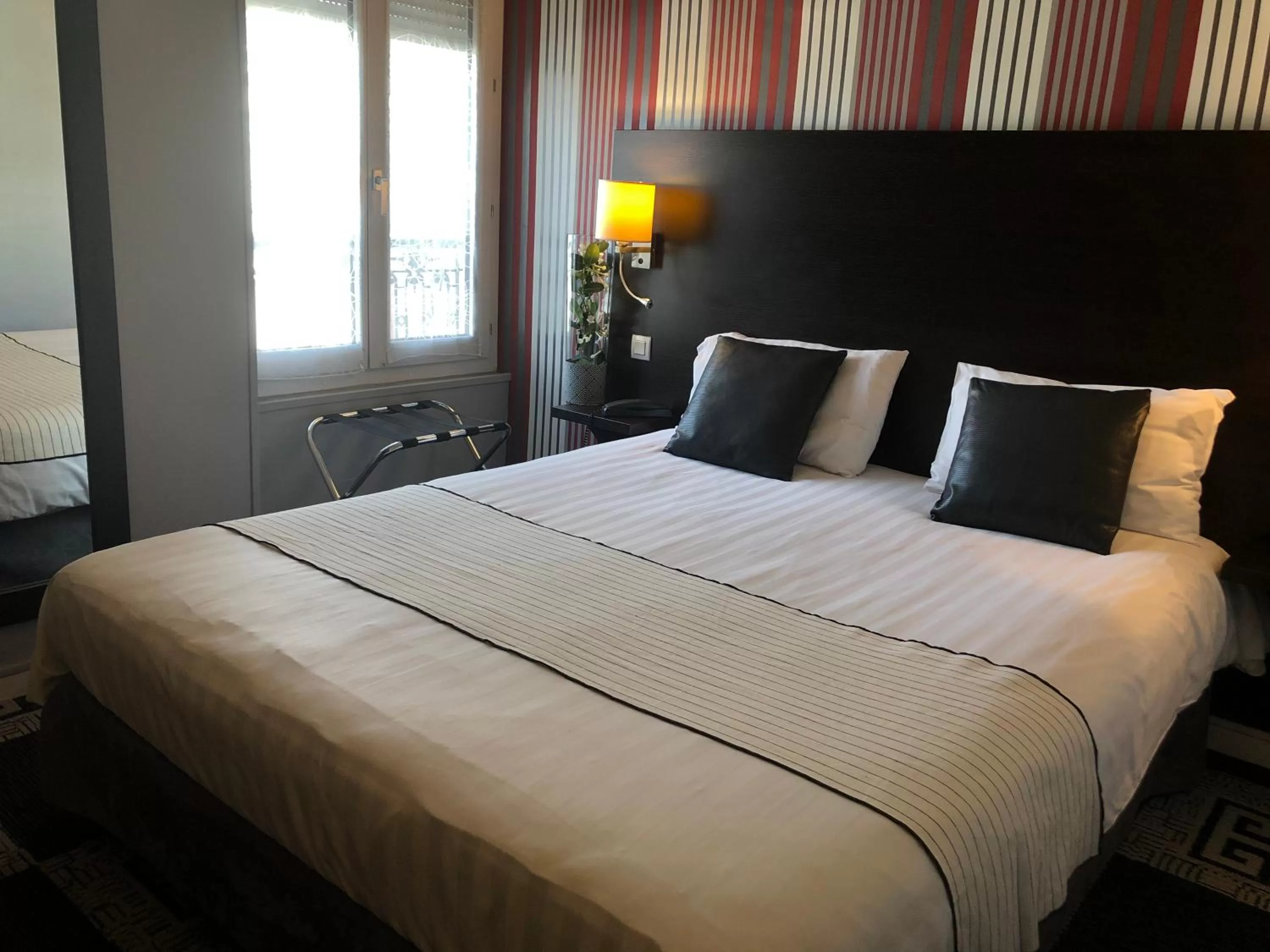 Bed in Logis Hotel - Le Charleston