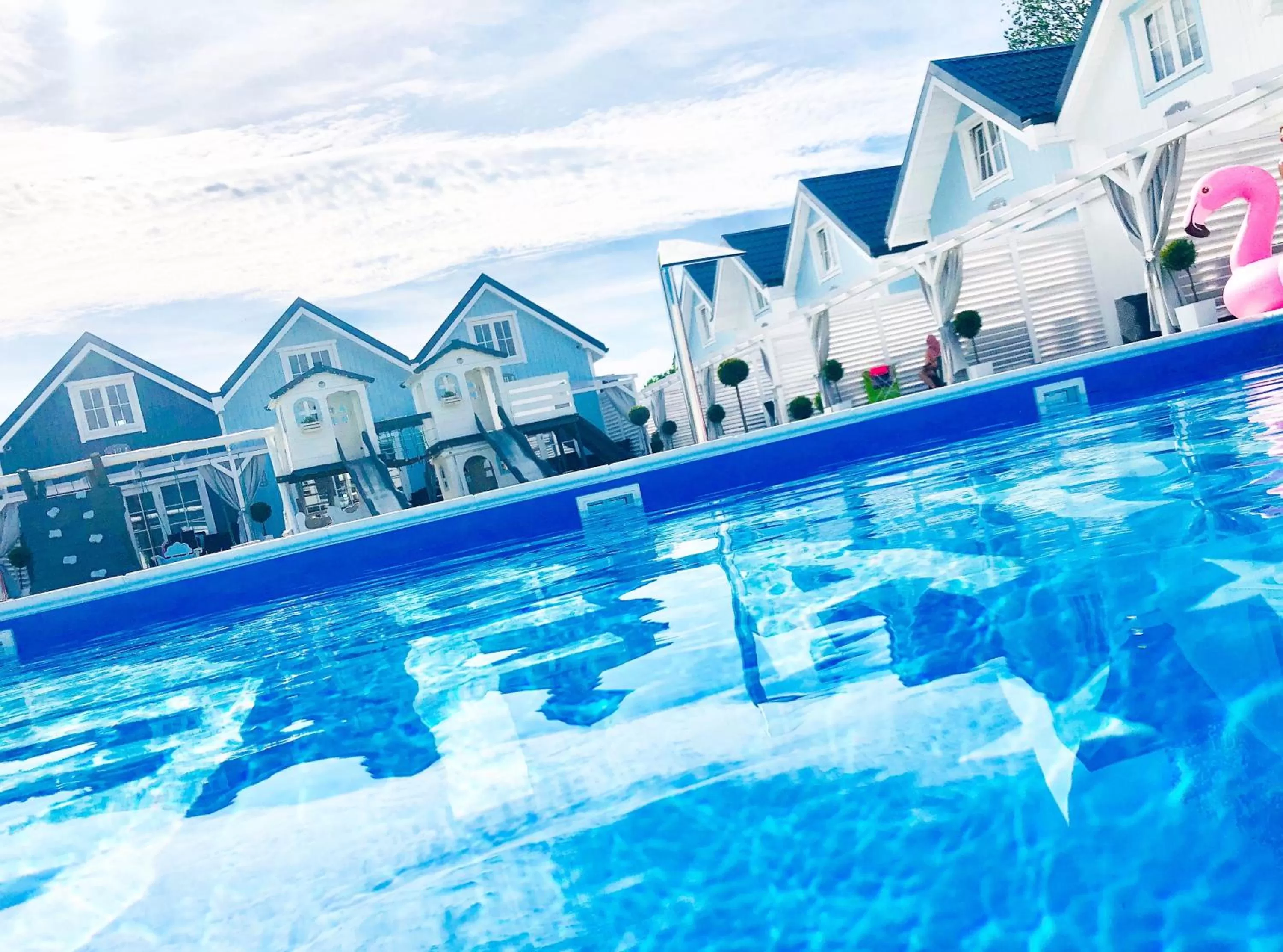Property building, Swimming Pool in Baltic Family - domki całoroczne nad morzem basen kidsclub rowery
