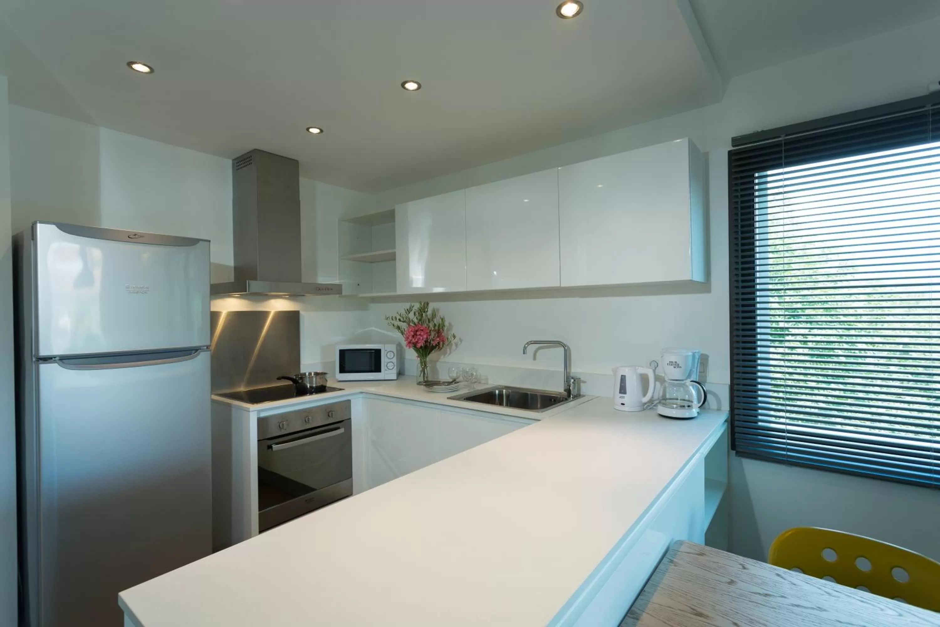 Kitchen or kitchenette in Résidence Hôtelière Alcyon