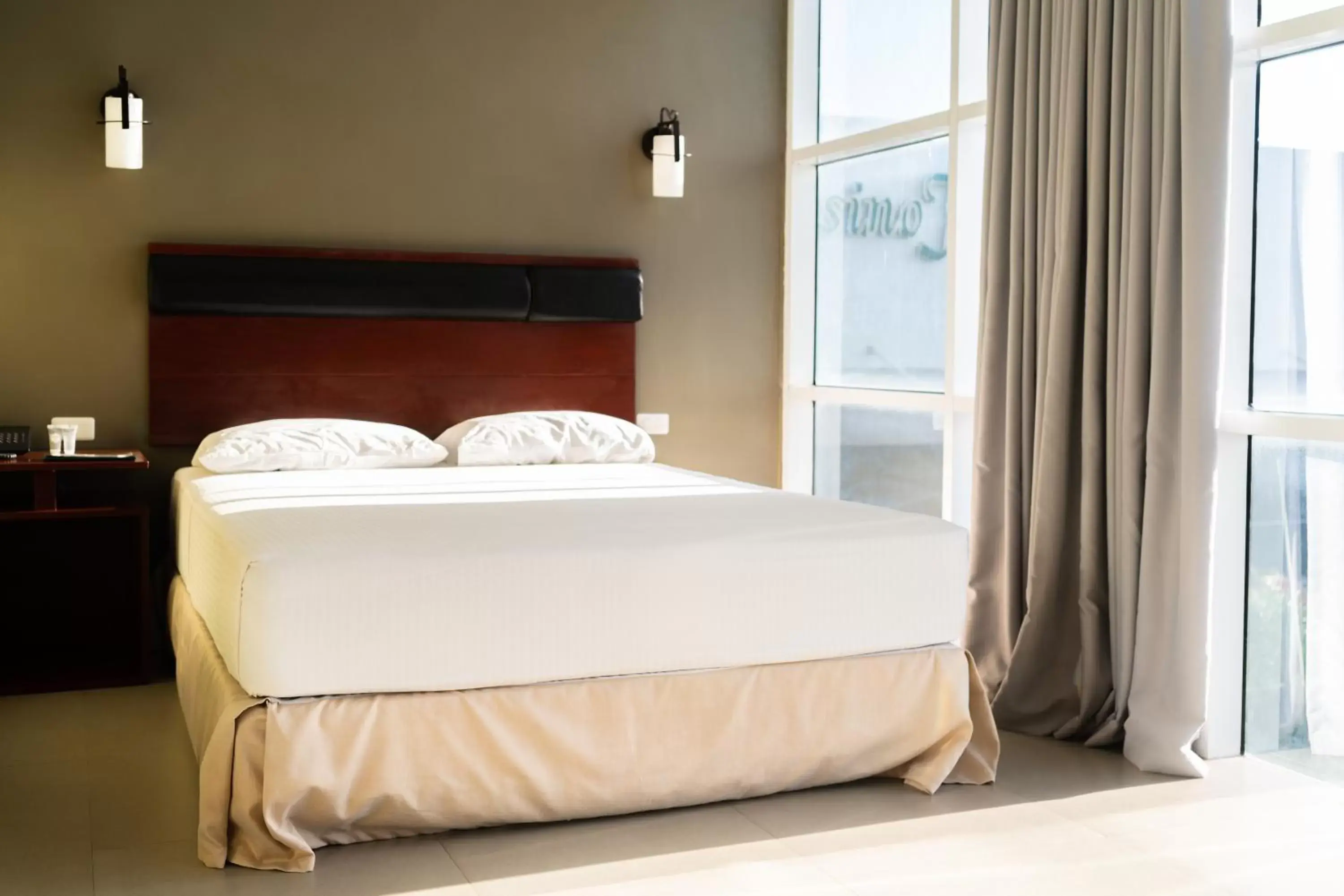 Bed in Dosi Hotel PH Bed in Dosi Hotel PH