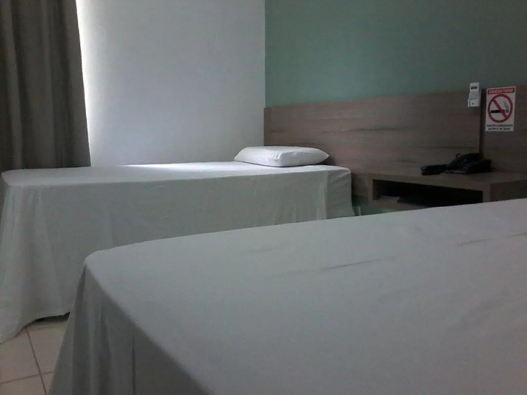 Bedroom, Bed in Hotel e Locadora Vizon