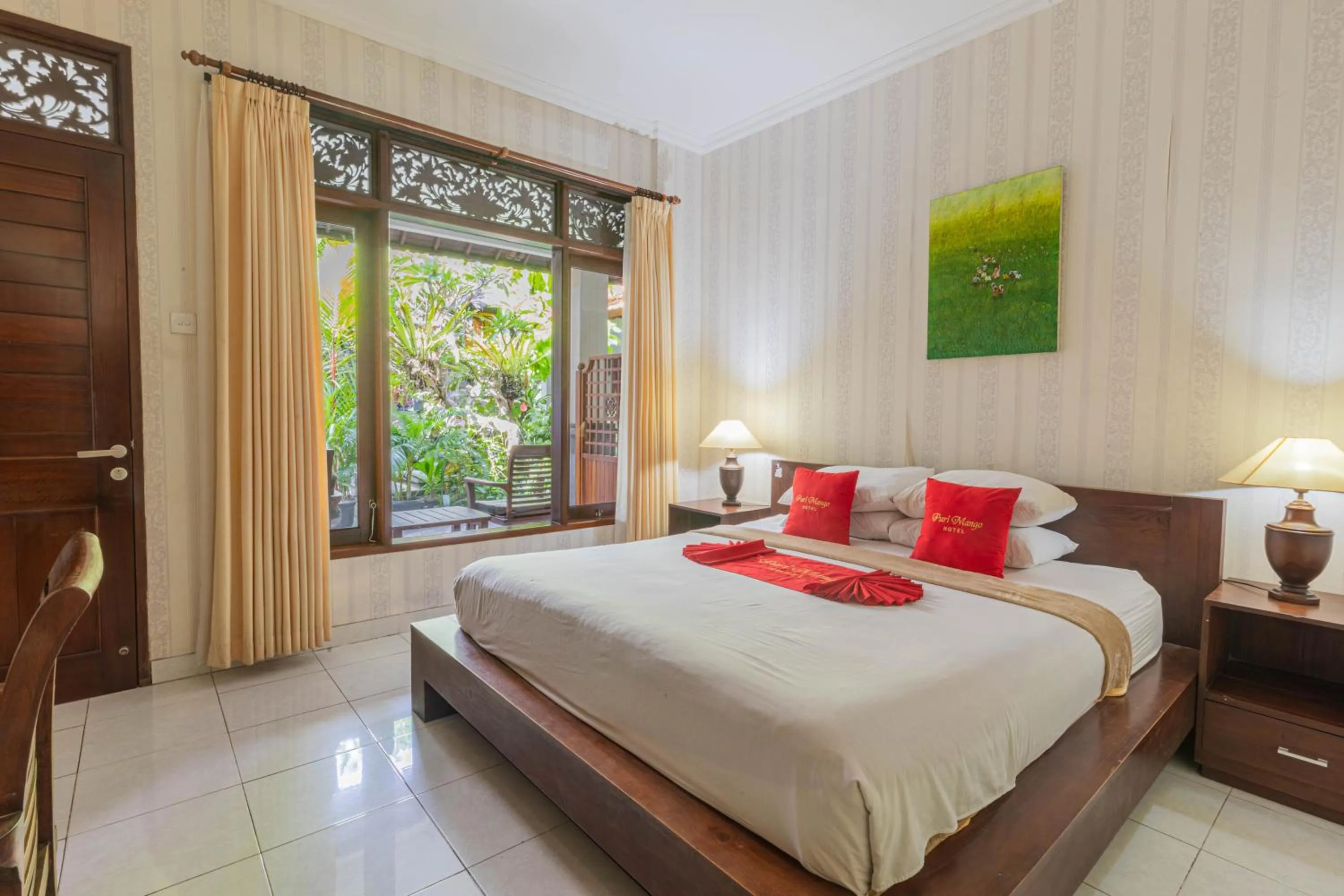 Bedroom in Puri Mango Guest House Sanur