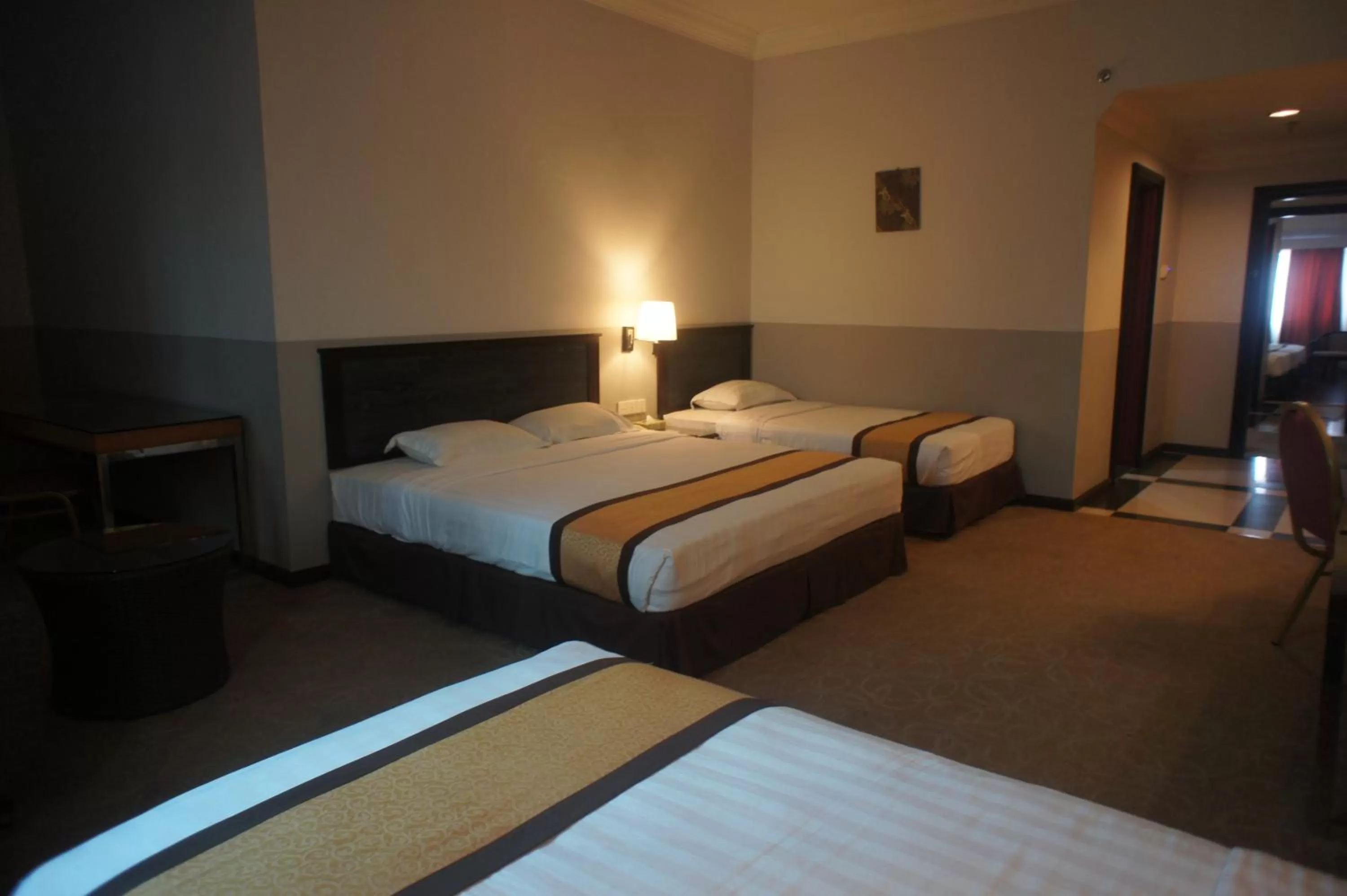 Bed in Tyng Garden Hotel