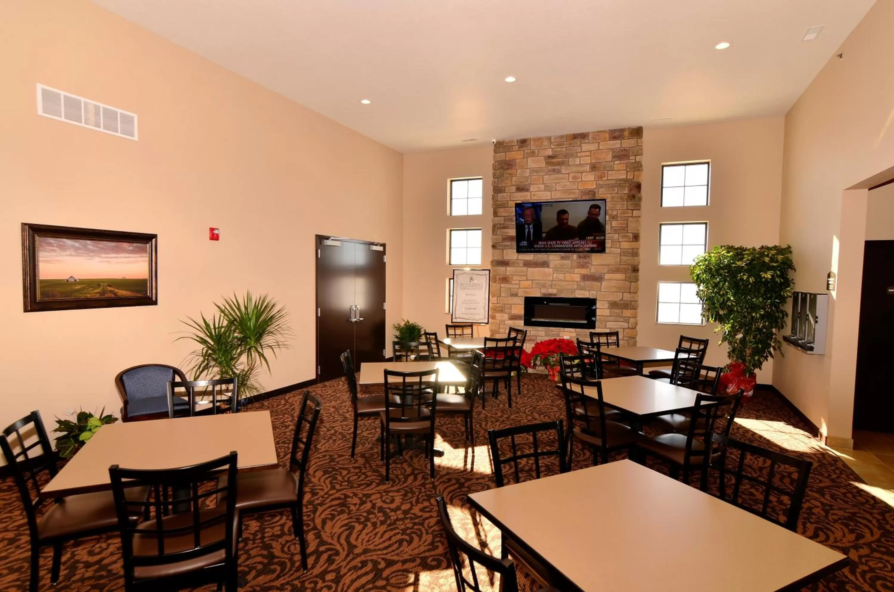 Communal lounge/ TV room in Cobblestone Inn & Suites - Holstein
