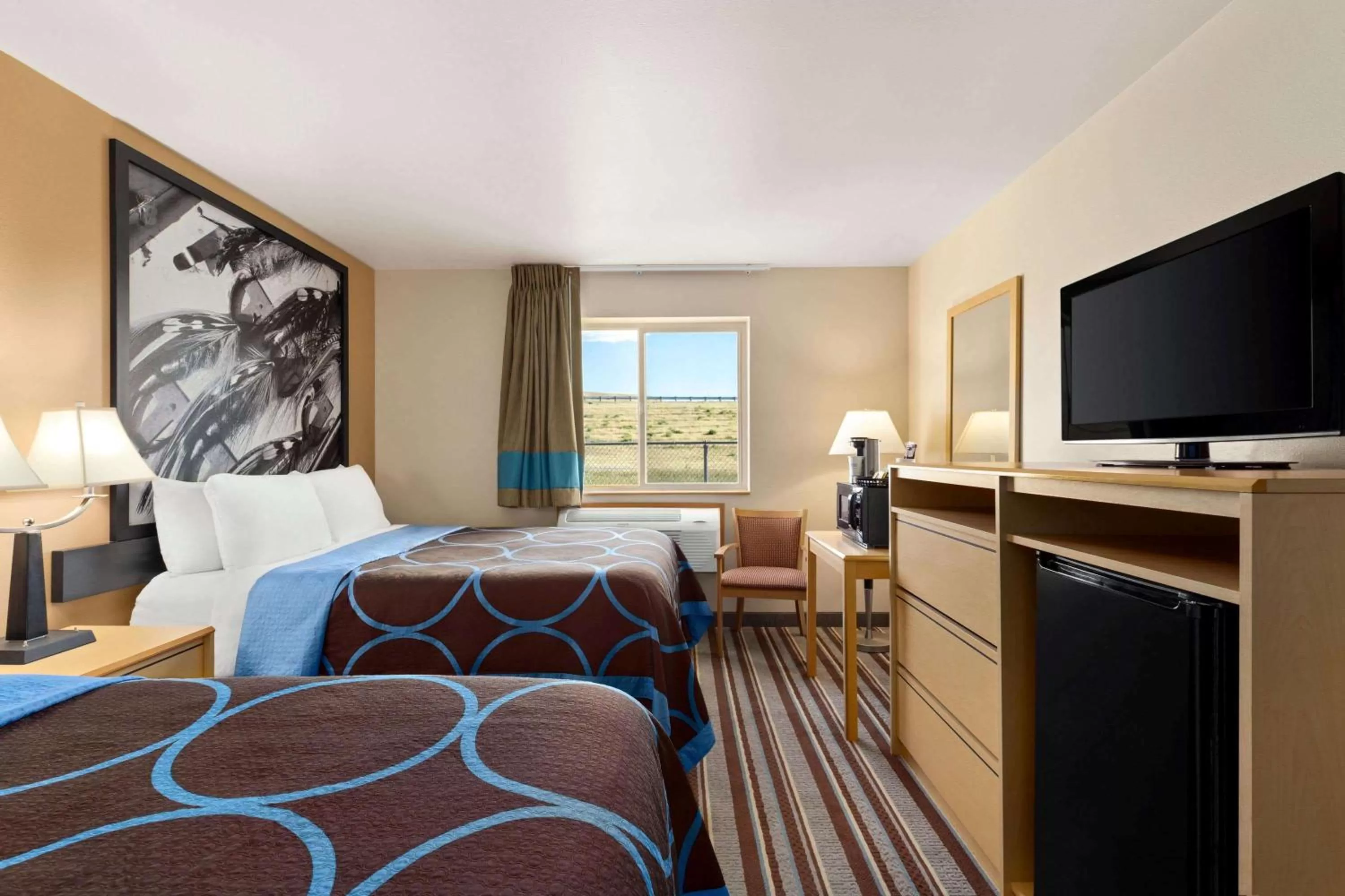 Photo of the whole room, TV/Entertainment Center in Super 8 by Wyndham Big Timber