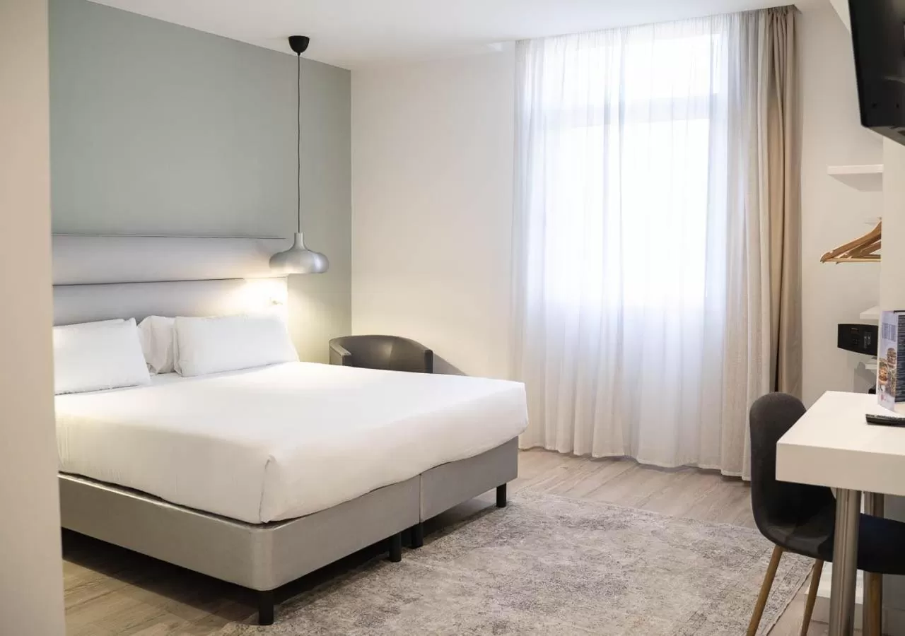 Bed in Hotel Pasarela