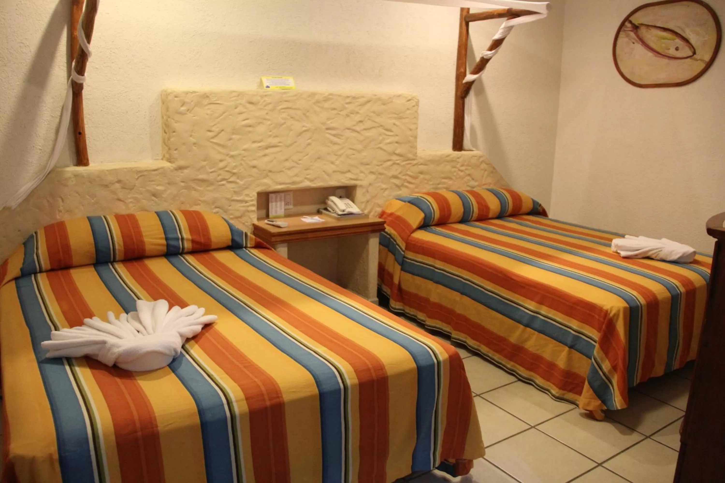 Bed in Hotel Palapa Palace