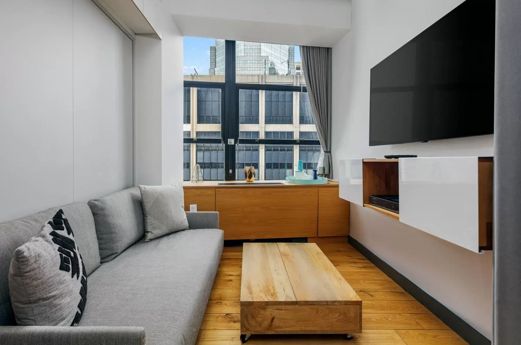 TV and multimedia, Seating Area in Placemakr Wall Street