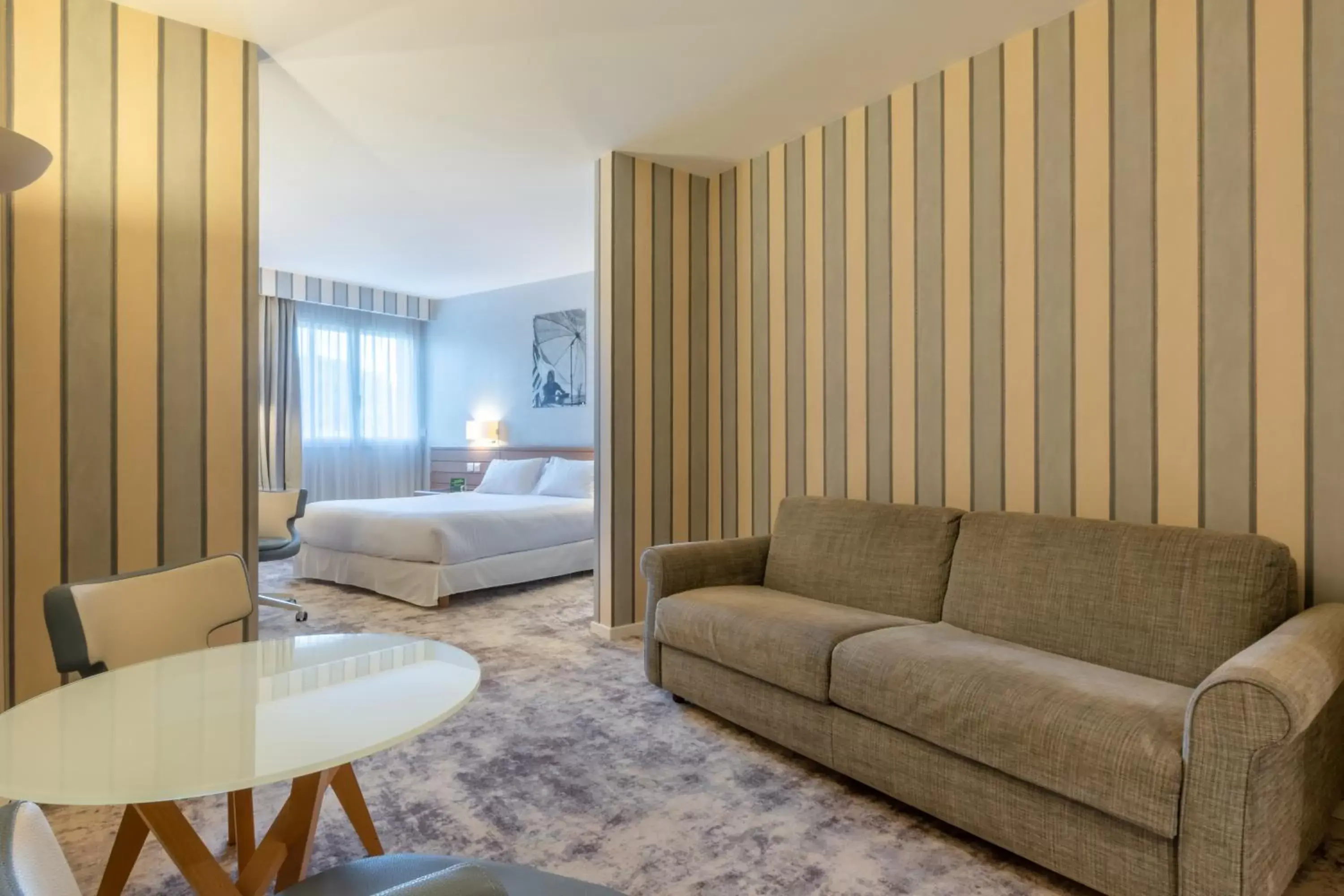 Bed, Seating Area in Holiday Inn Nice - Port St Laurent, an IHG Hotel