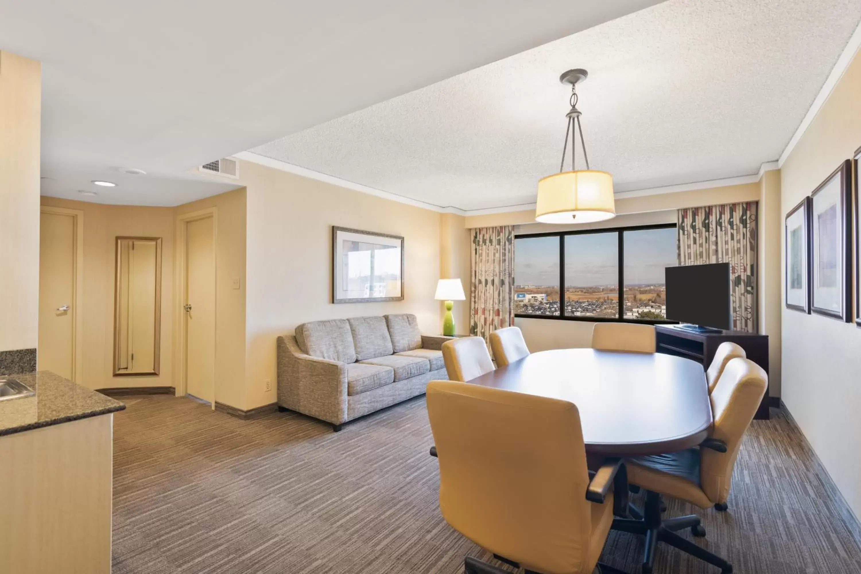 Living room, Dining Area in Harmony Suites Secaucus Meadowlands