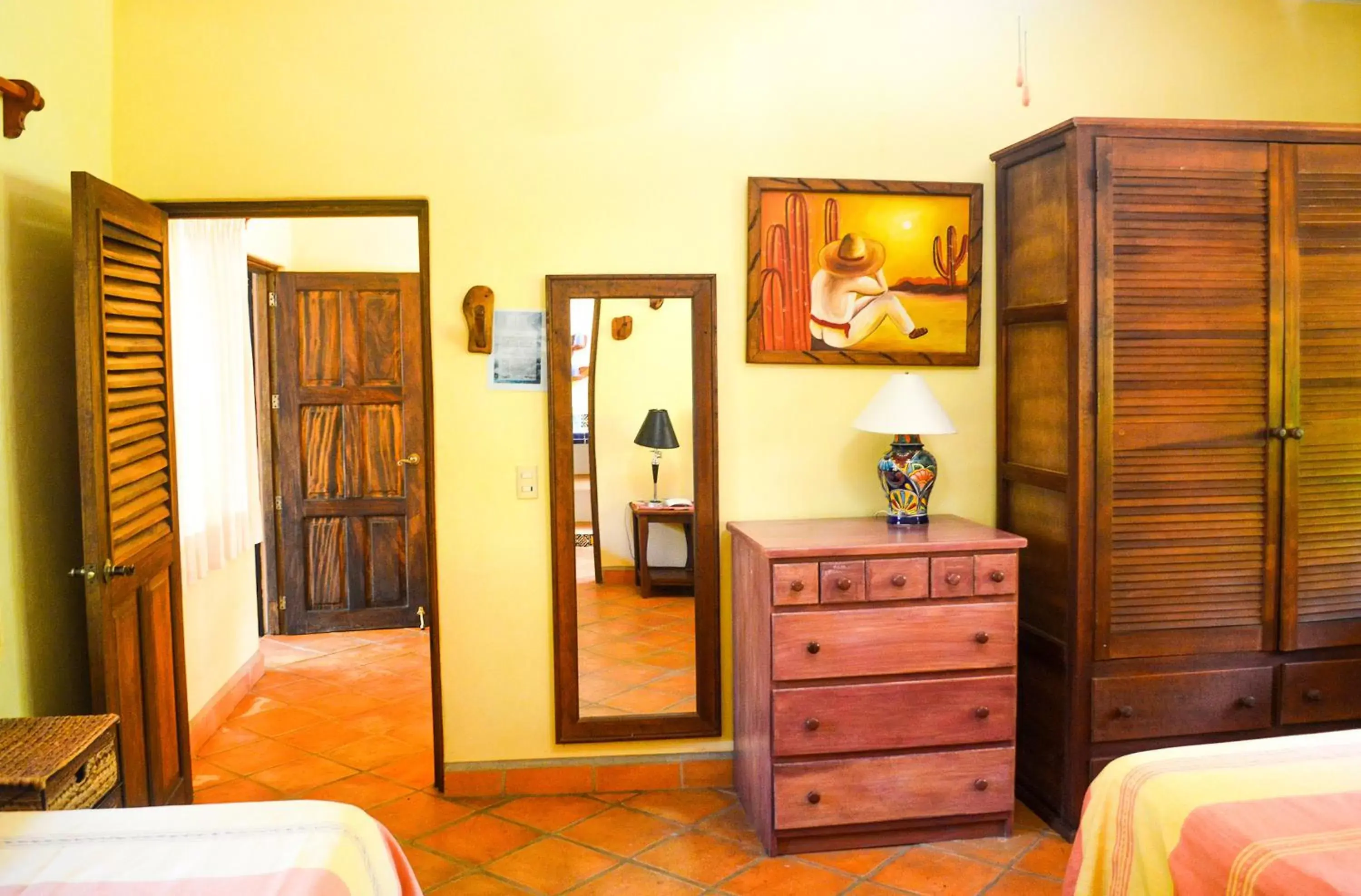 Bedroom, TV/Entertainment Center in Hotel Casamar Suites