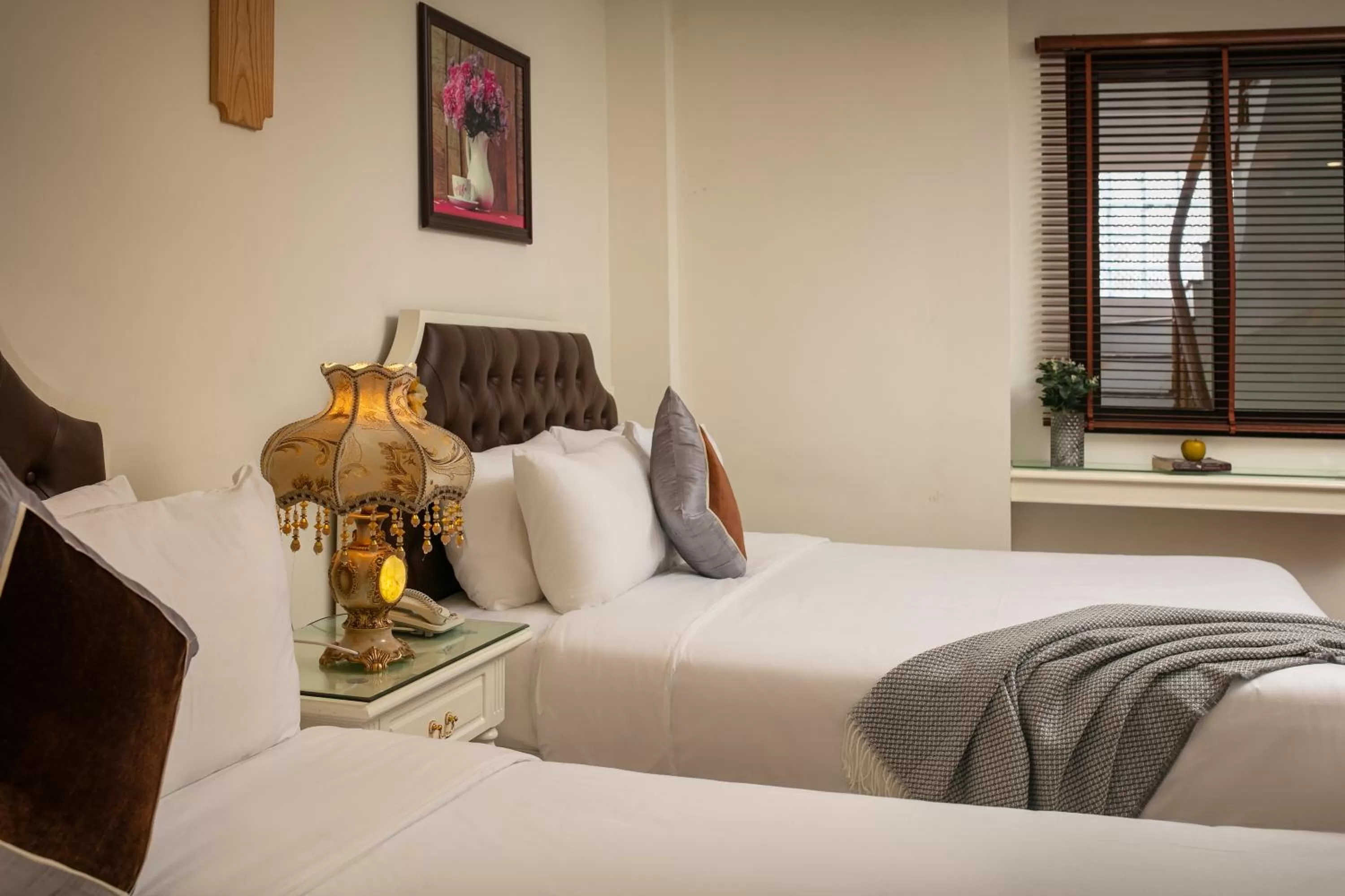 Bed in TrangTrang Boutique Hotel