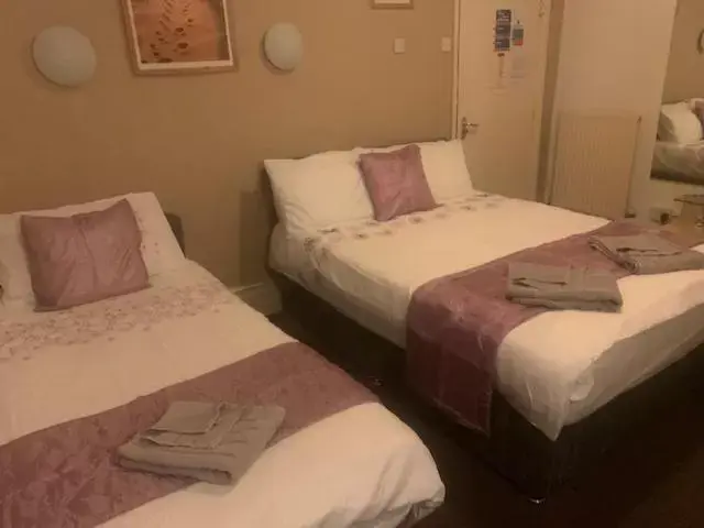 Bed in Lucena Hotel