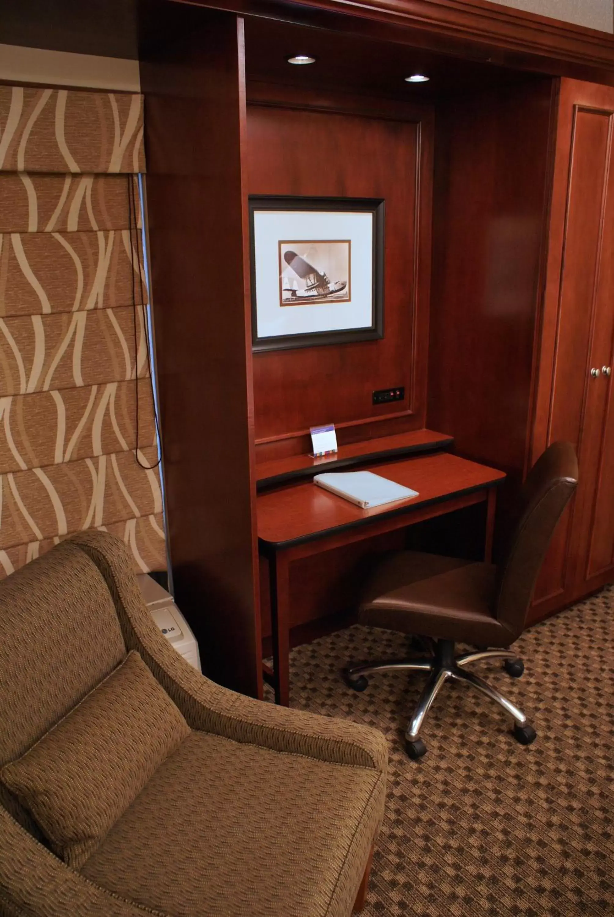 Business facilities, TV/Entertainment Center in The Addison Hotel SureStay Collection by Best Western