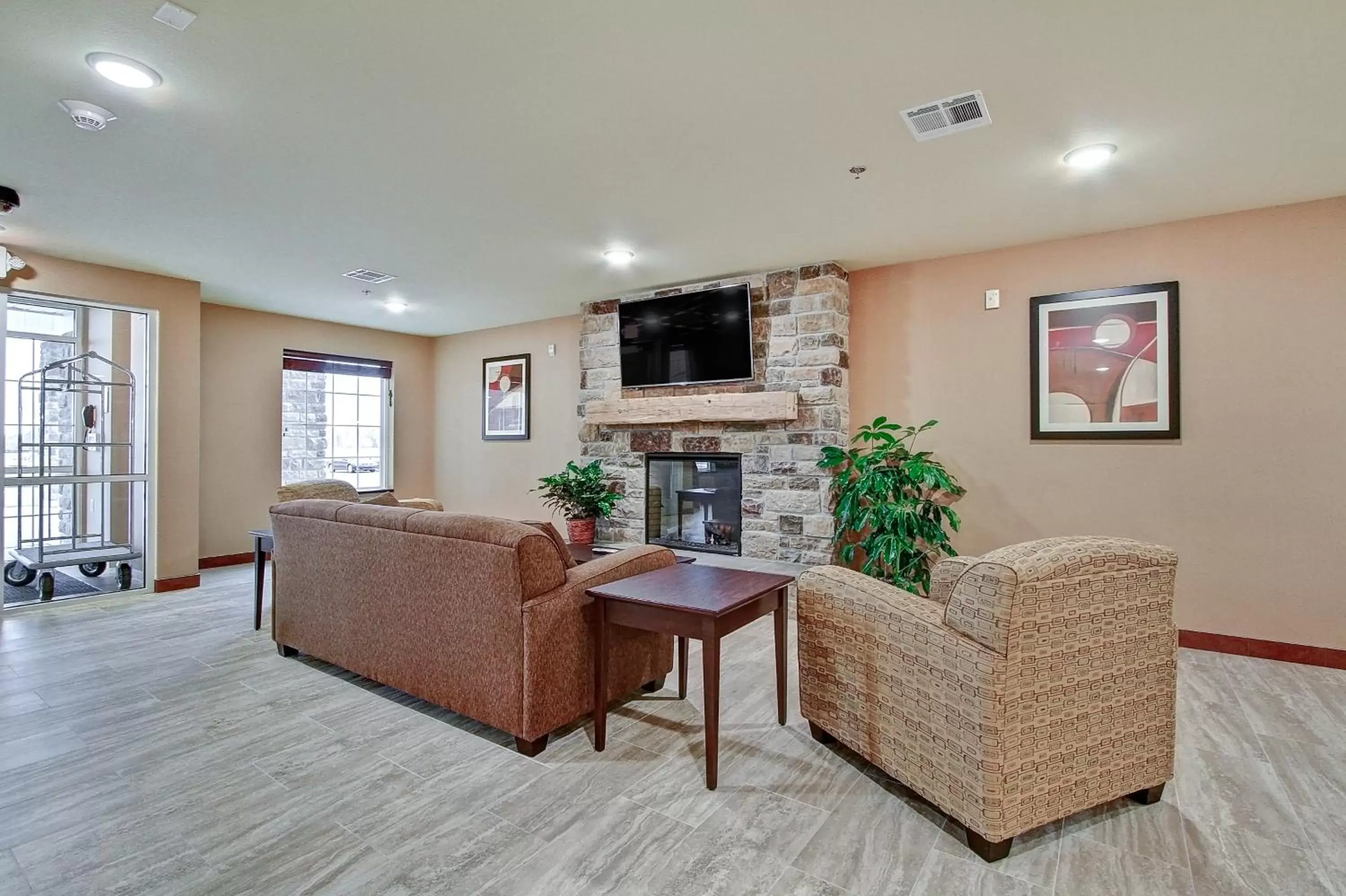 Lobby or reception, Seating Area in Cobblestone Hotel & Suites Pulaski/Green Bay